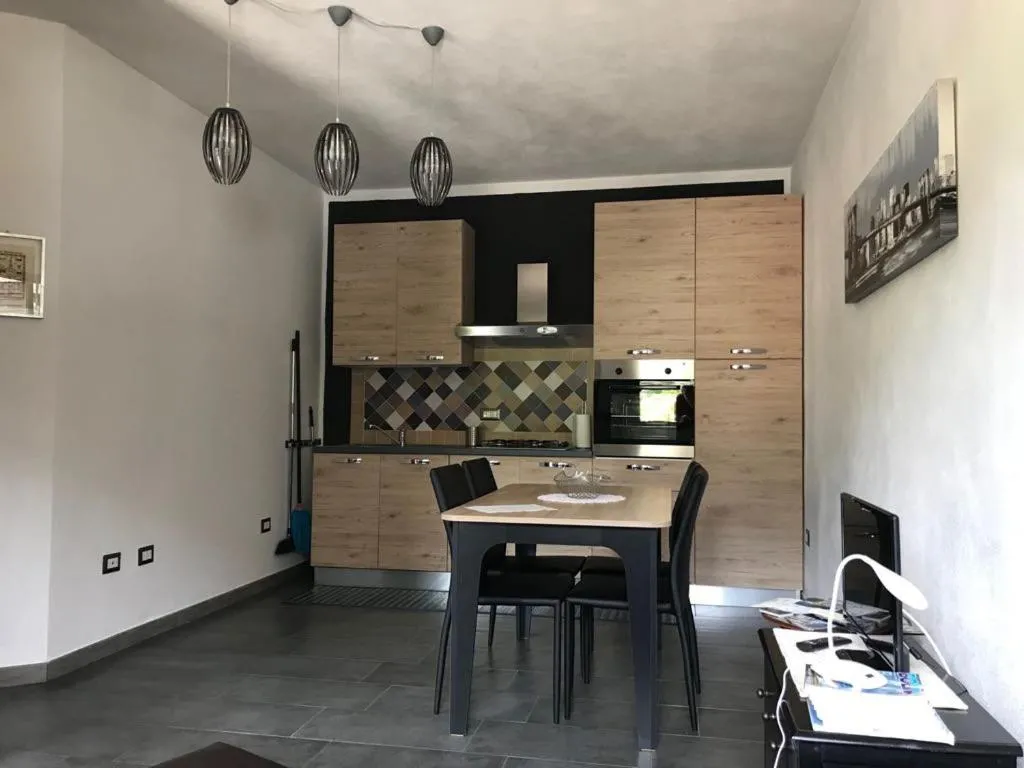 Kitchen or kitchenette in Appartamento Rosmarino
