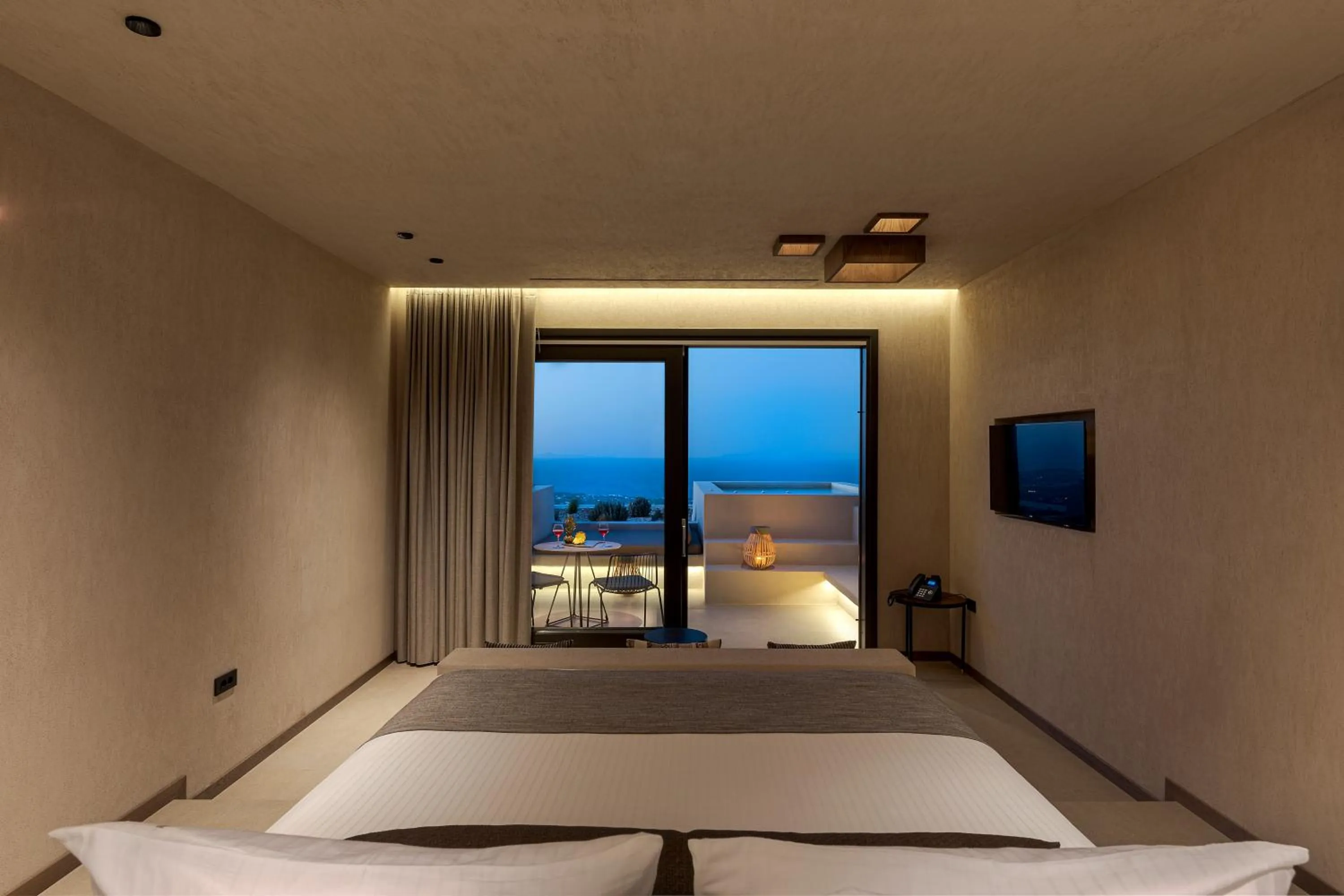 Bed in North Santorini - A Luxury Spa Hotel