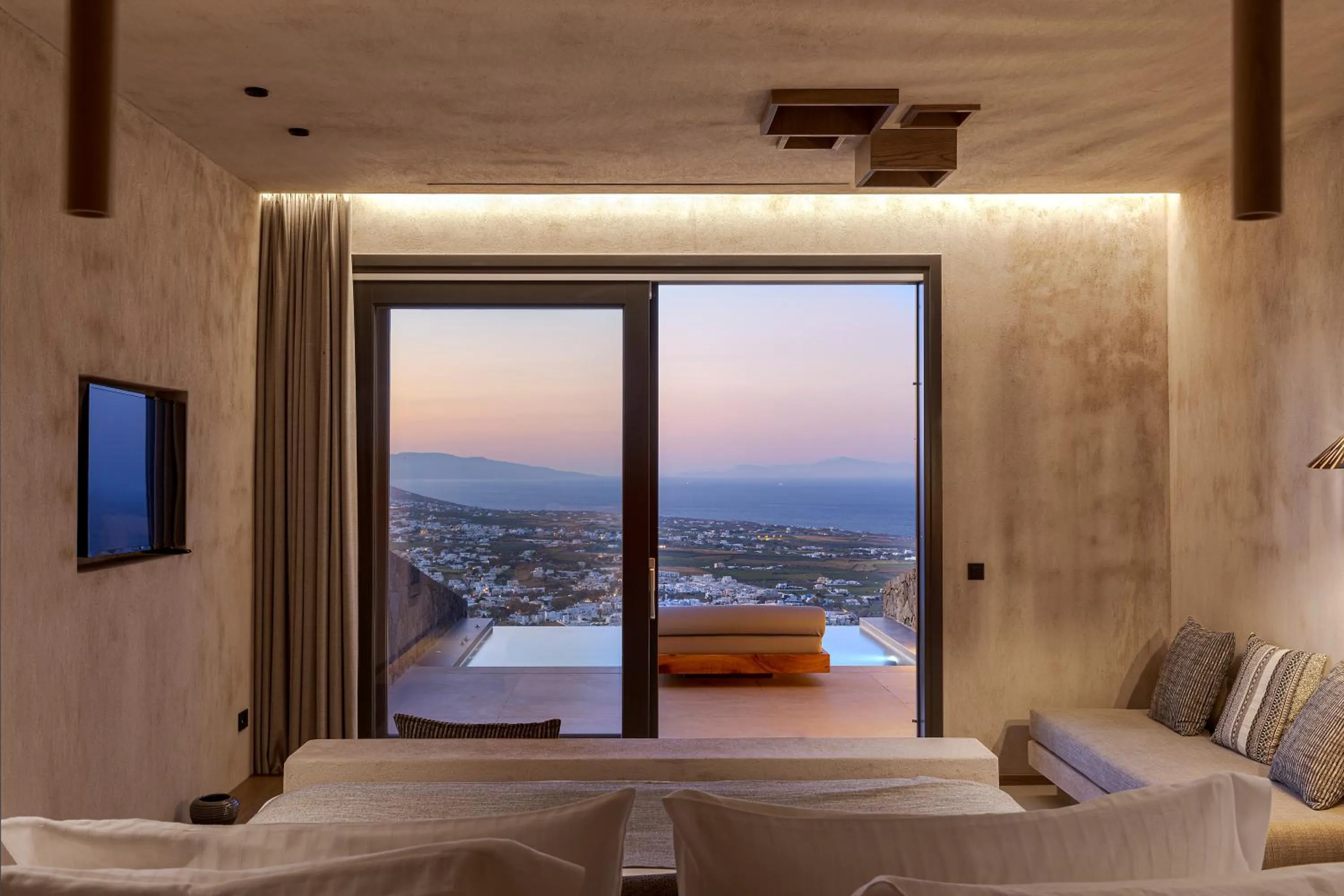 Bed in North Santorini - A Luxury Spa Hotel