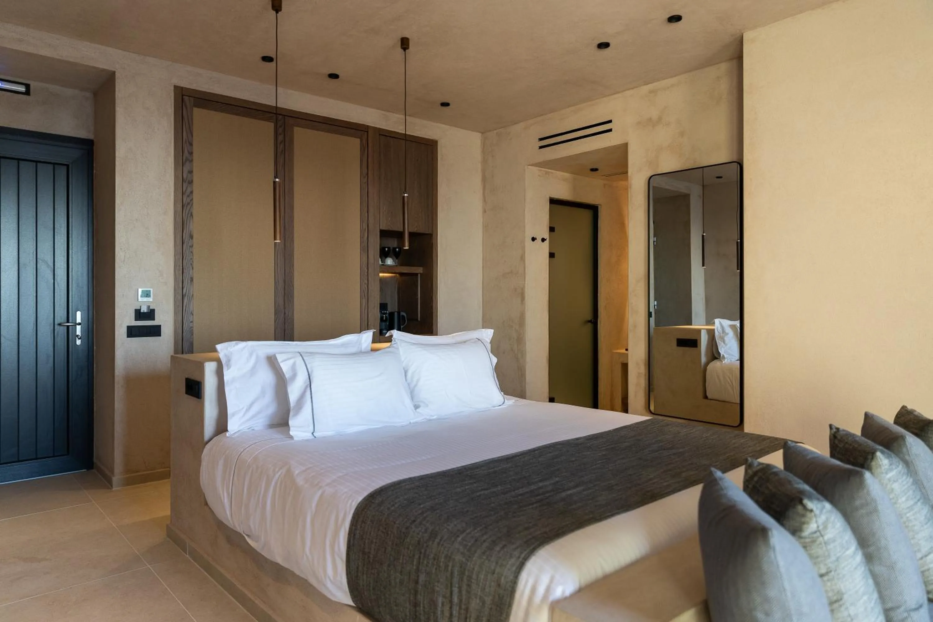 Bed in North Santorini - A Luxury Spa Hotel