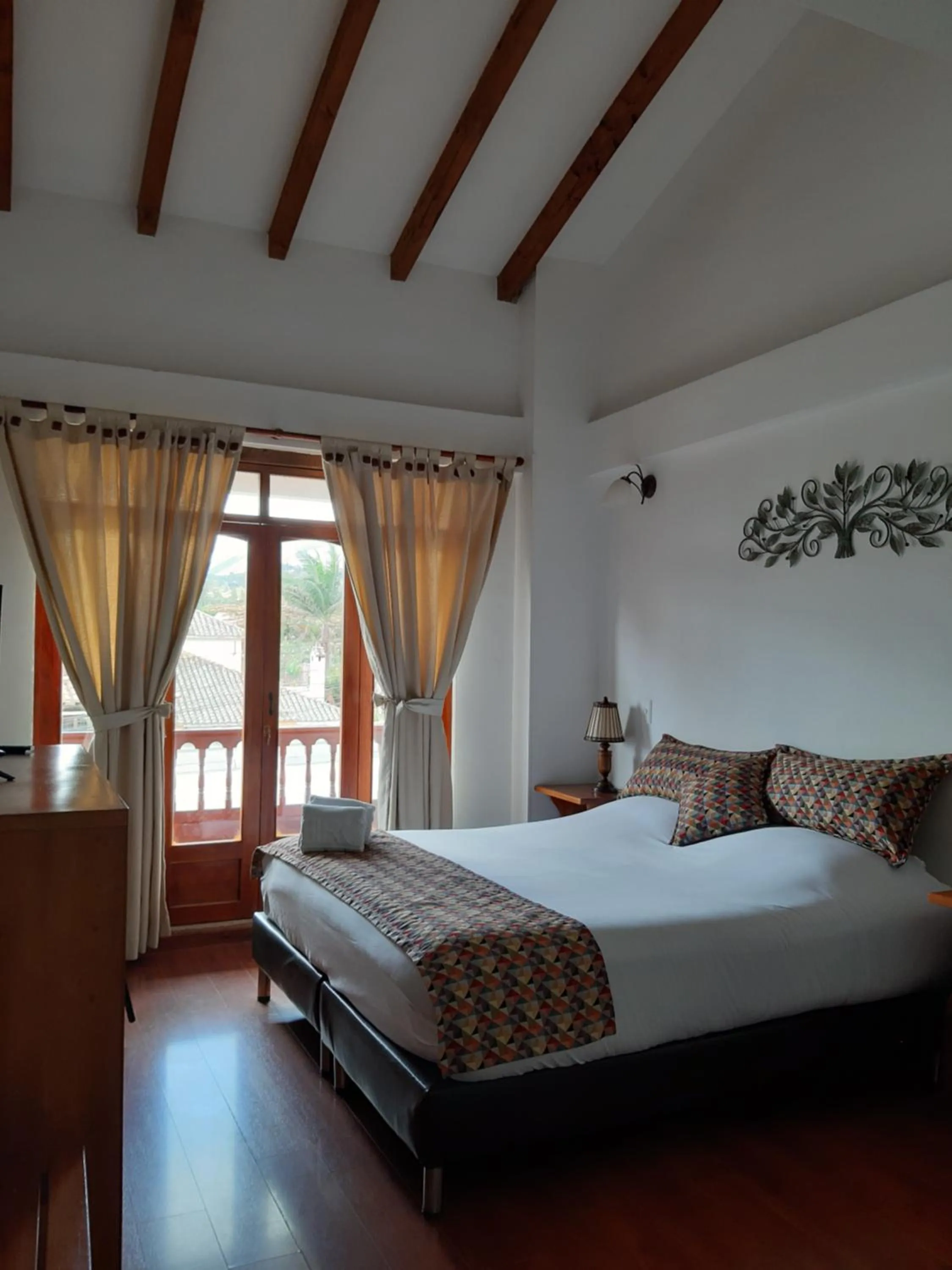 Property building, Bed in Hotel El Giro