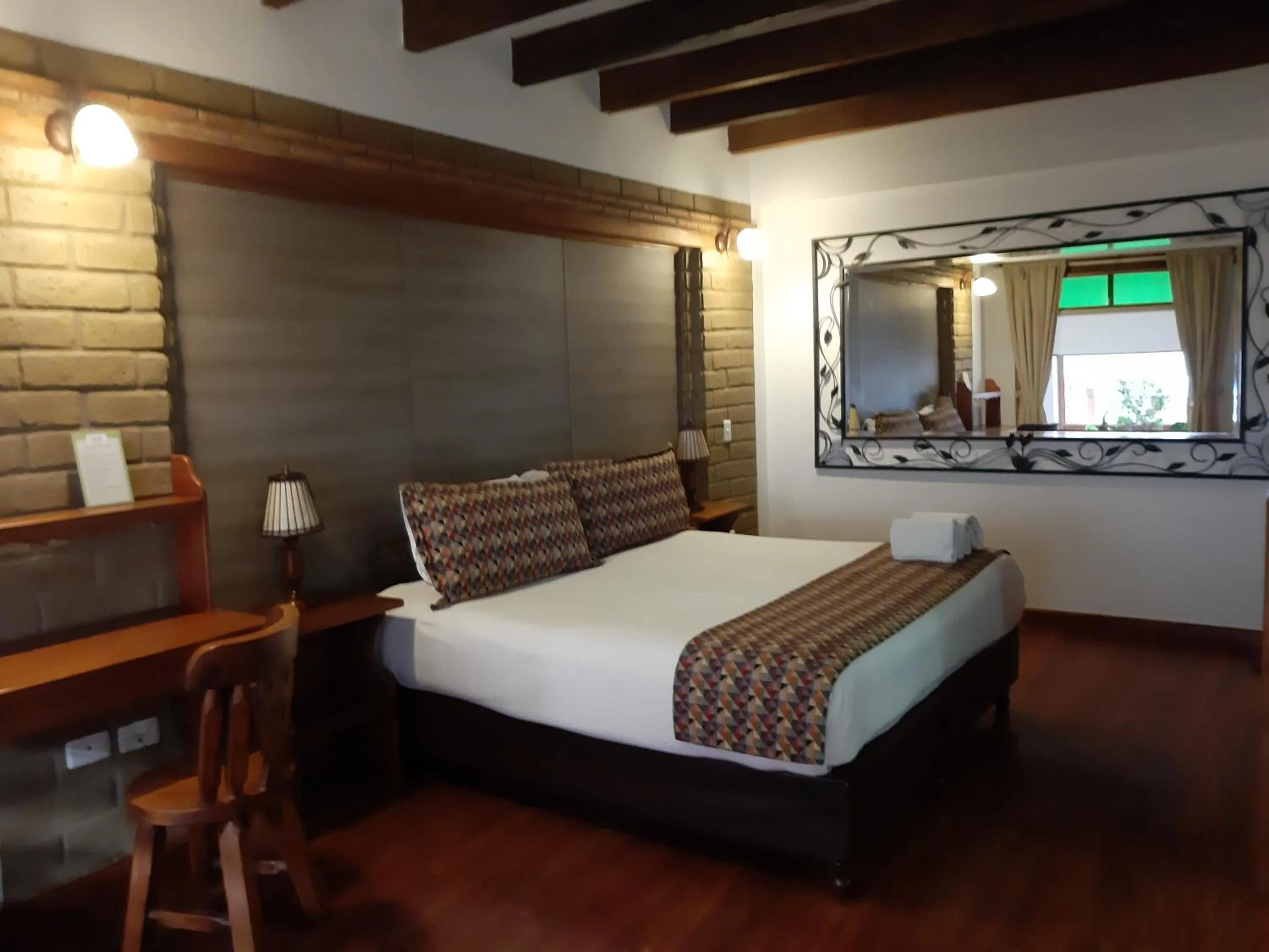 Property building, Bed in Hotel El Giro