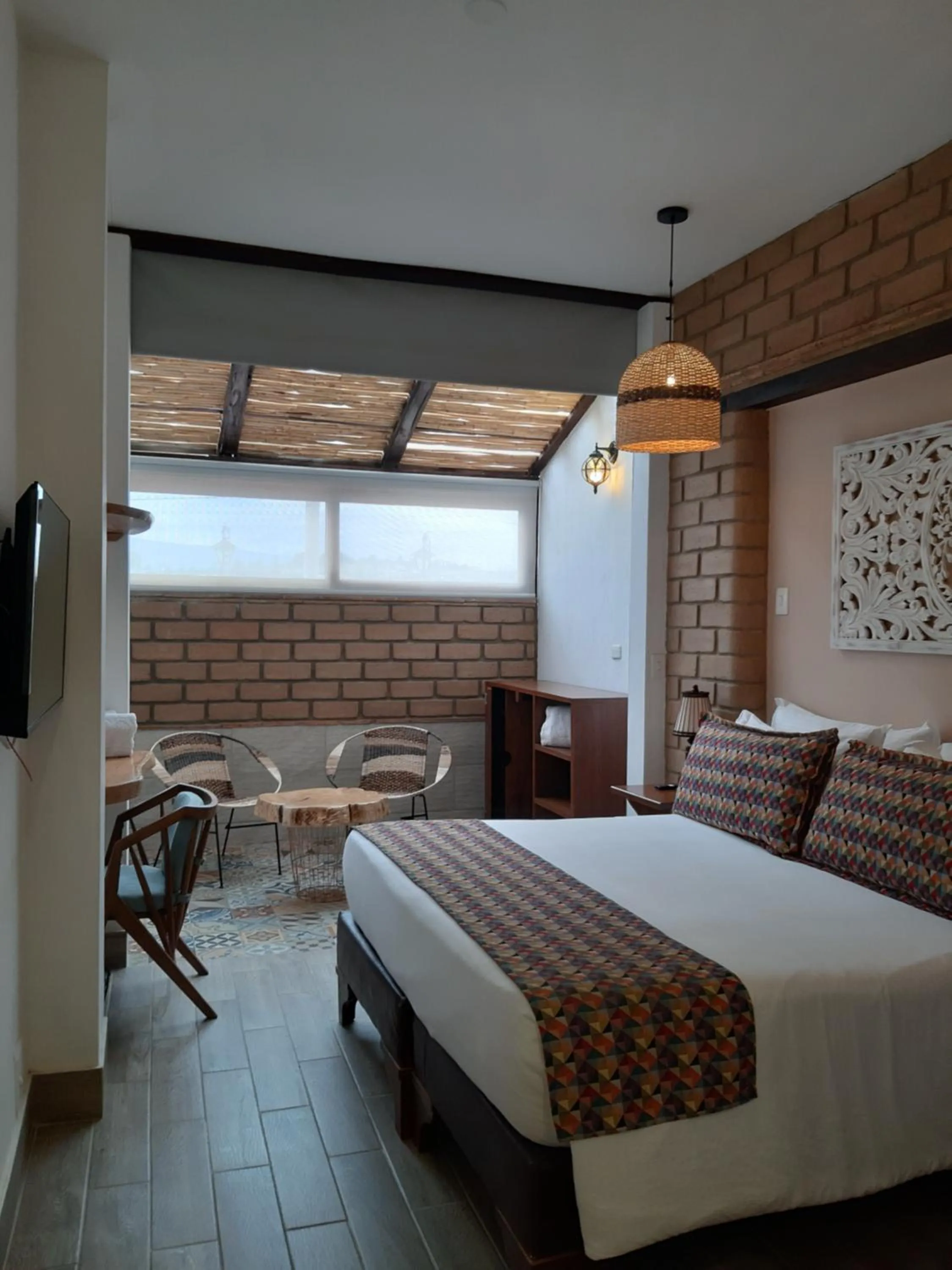 Living room, Bed in Hotel El Giro