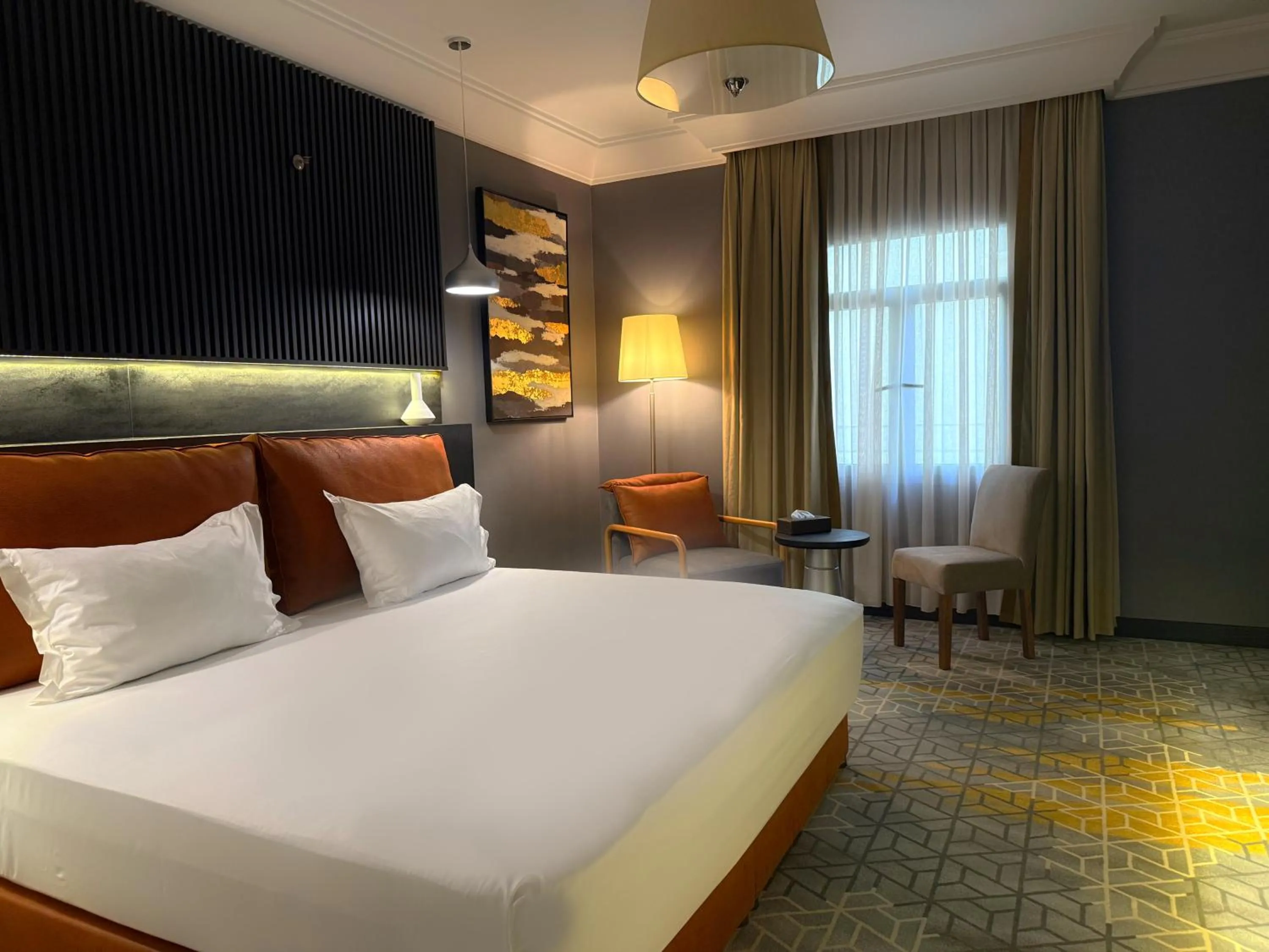 Bed in Crown Town Hotel