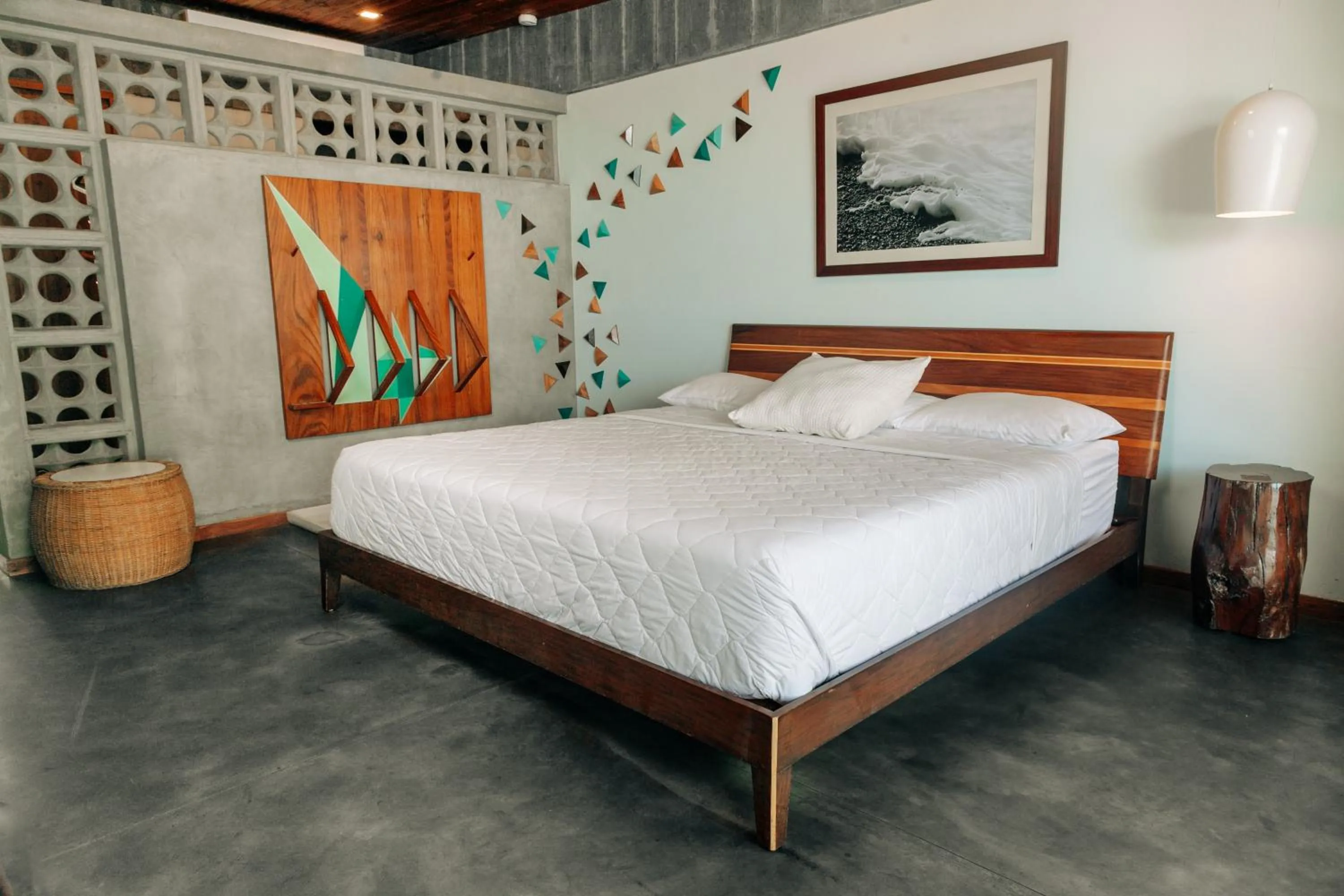 Bed in Puro Surf Hotel & Performance Academy