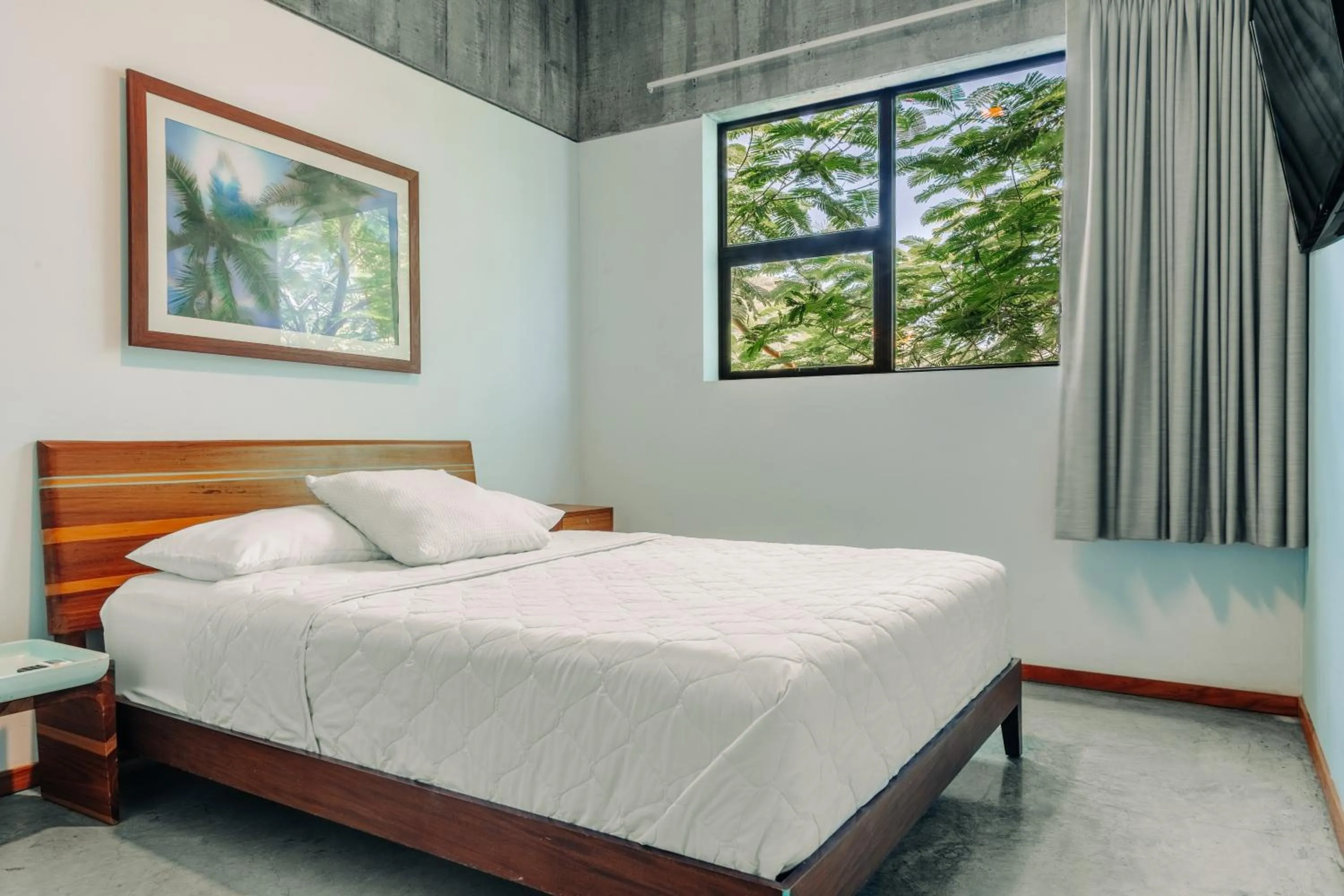 Bed in Puro Surf Hotel & Performance Academy