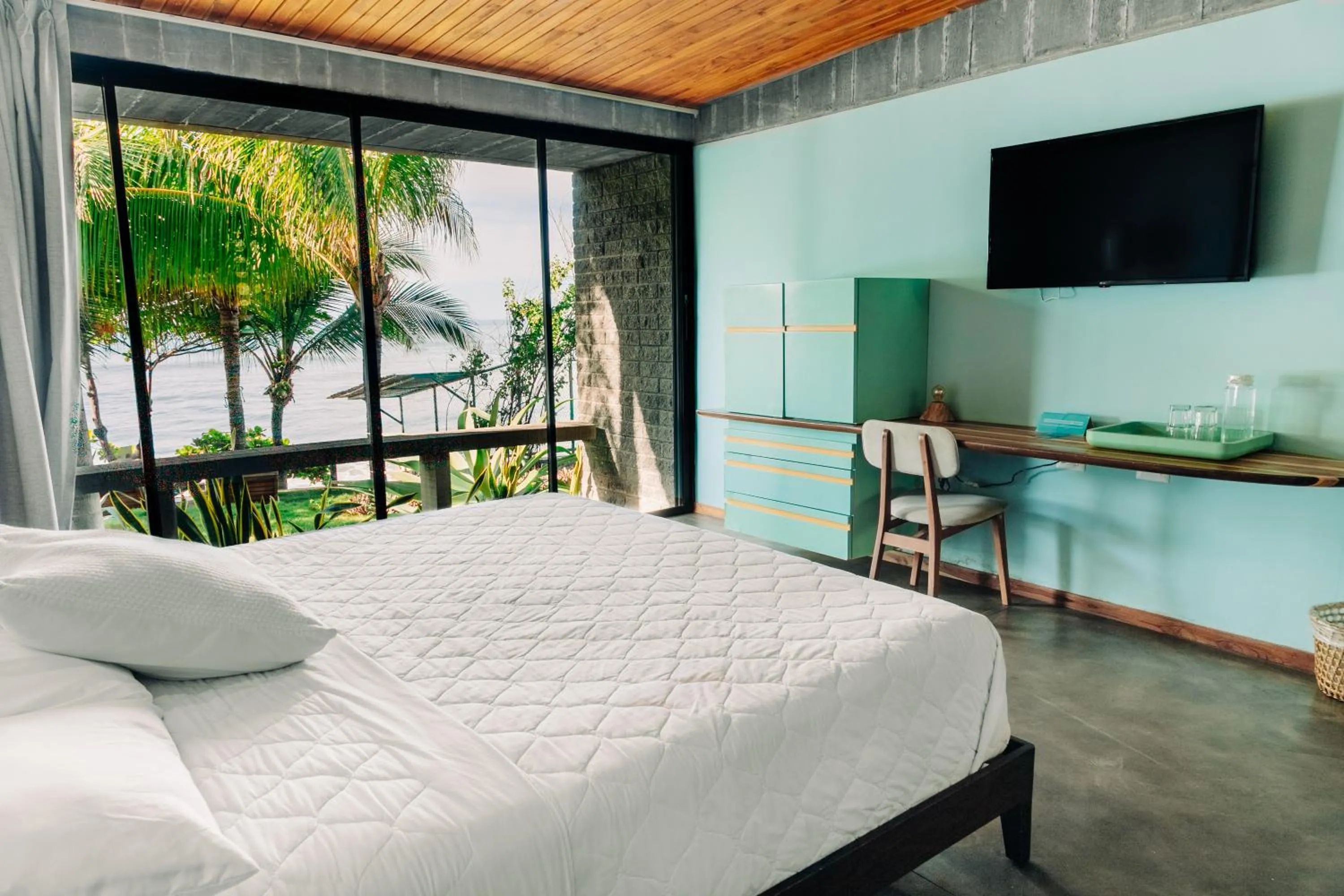 Bed in Puro Surf Hotel & Performance Academy