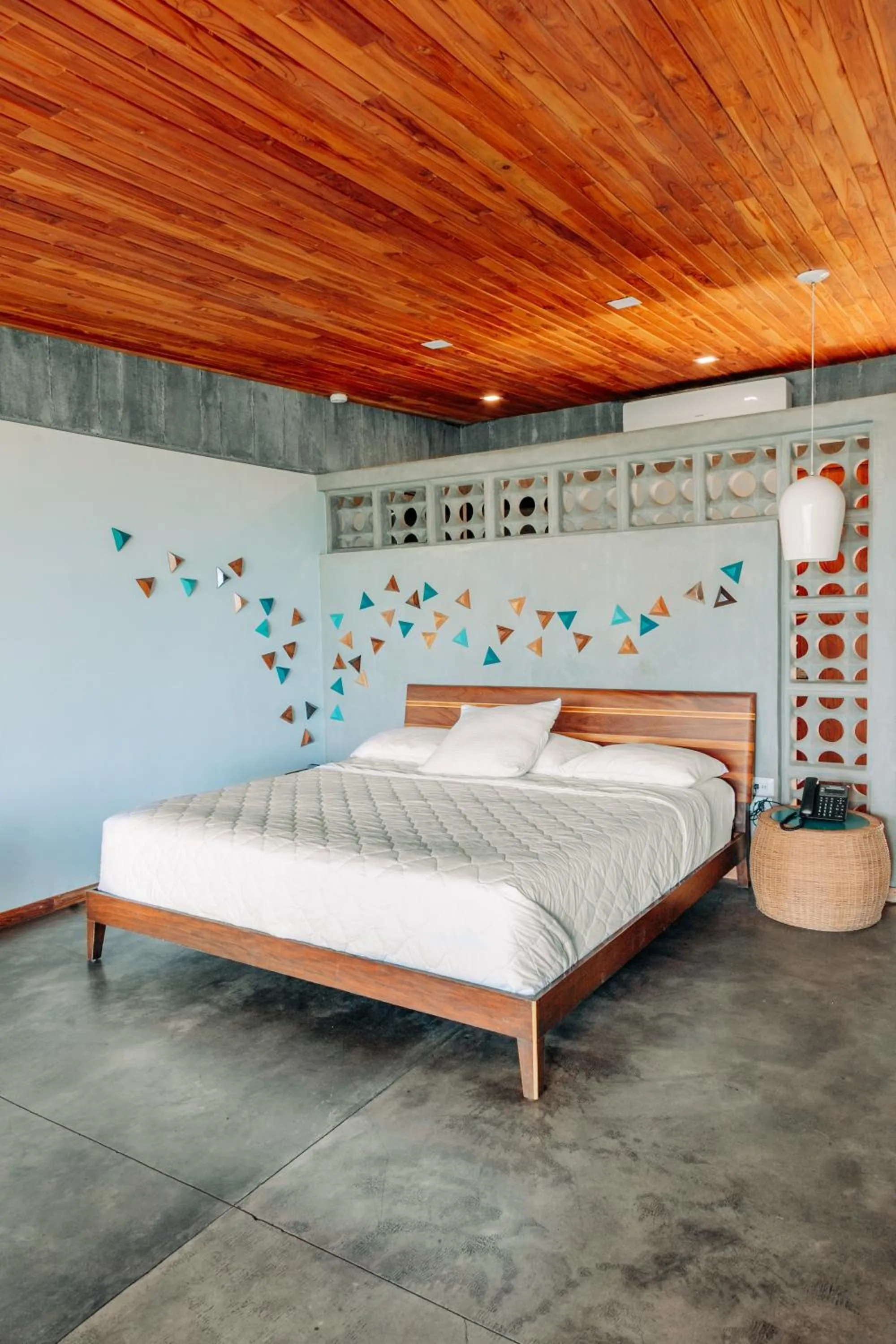 Bed in Puro Surf Hotel & Performance Academy