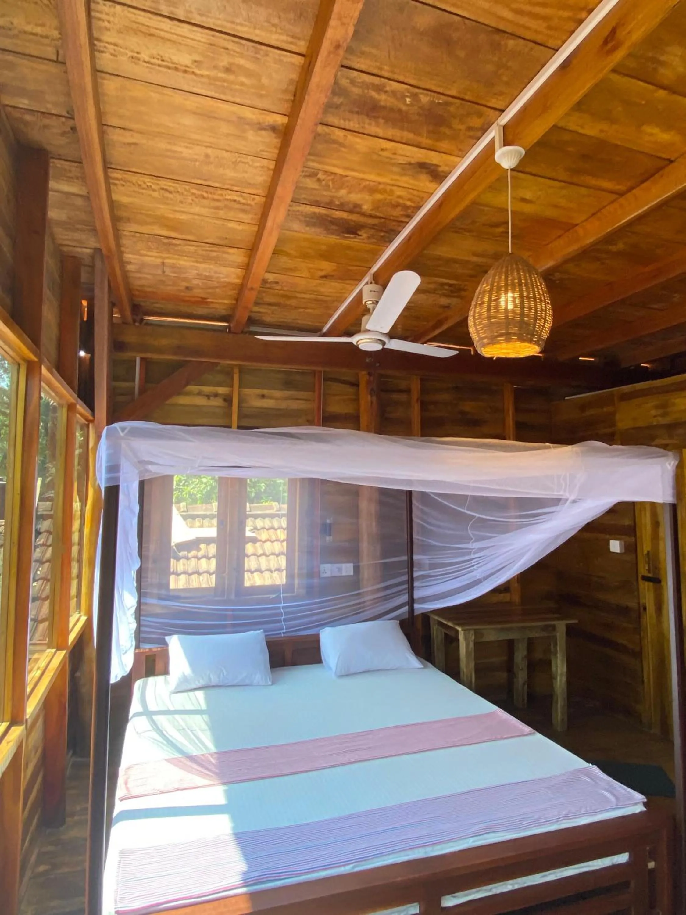 Bed in Surf Beach Hotel