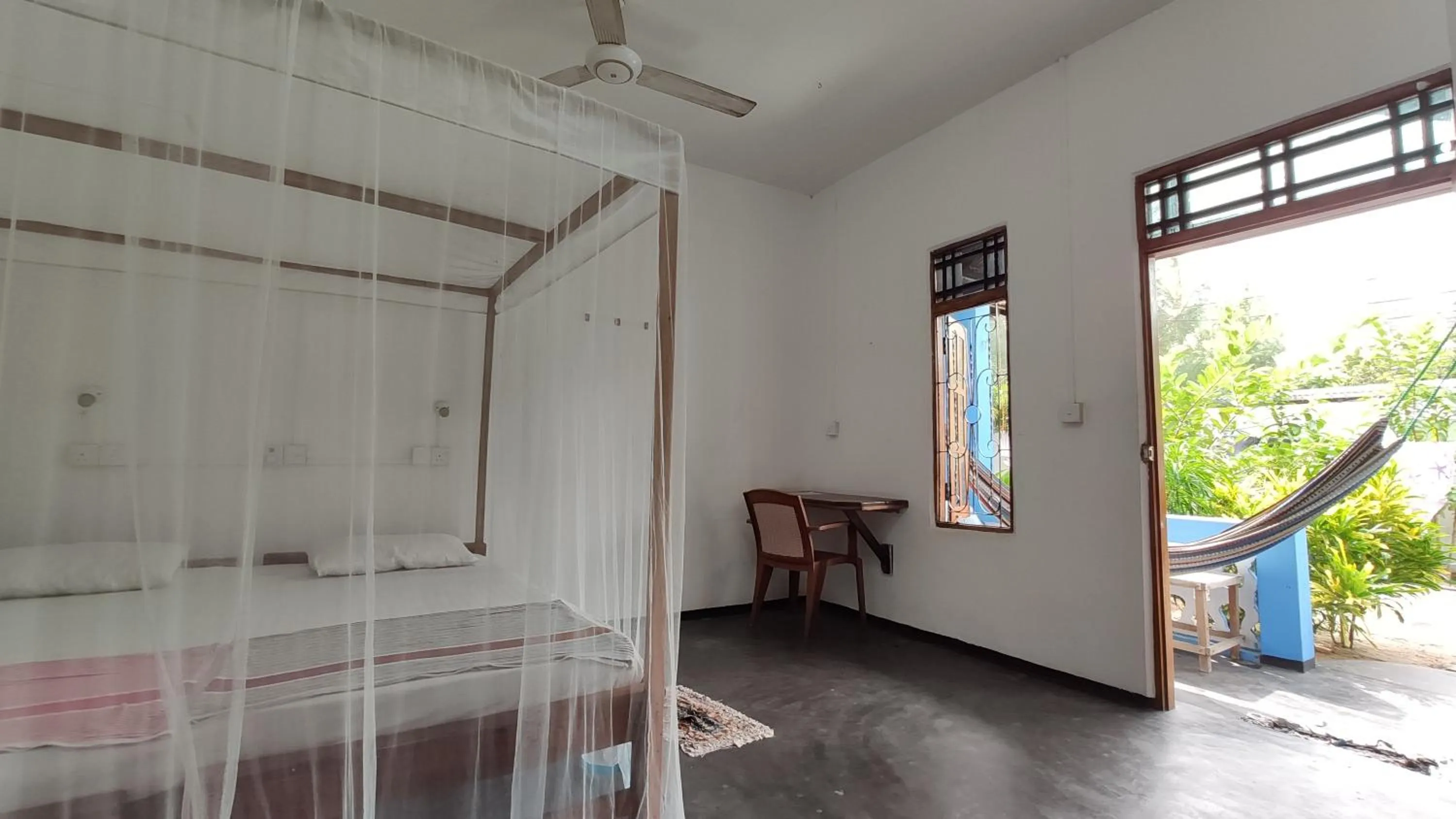 Bed in Surf Beach Hotel