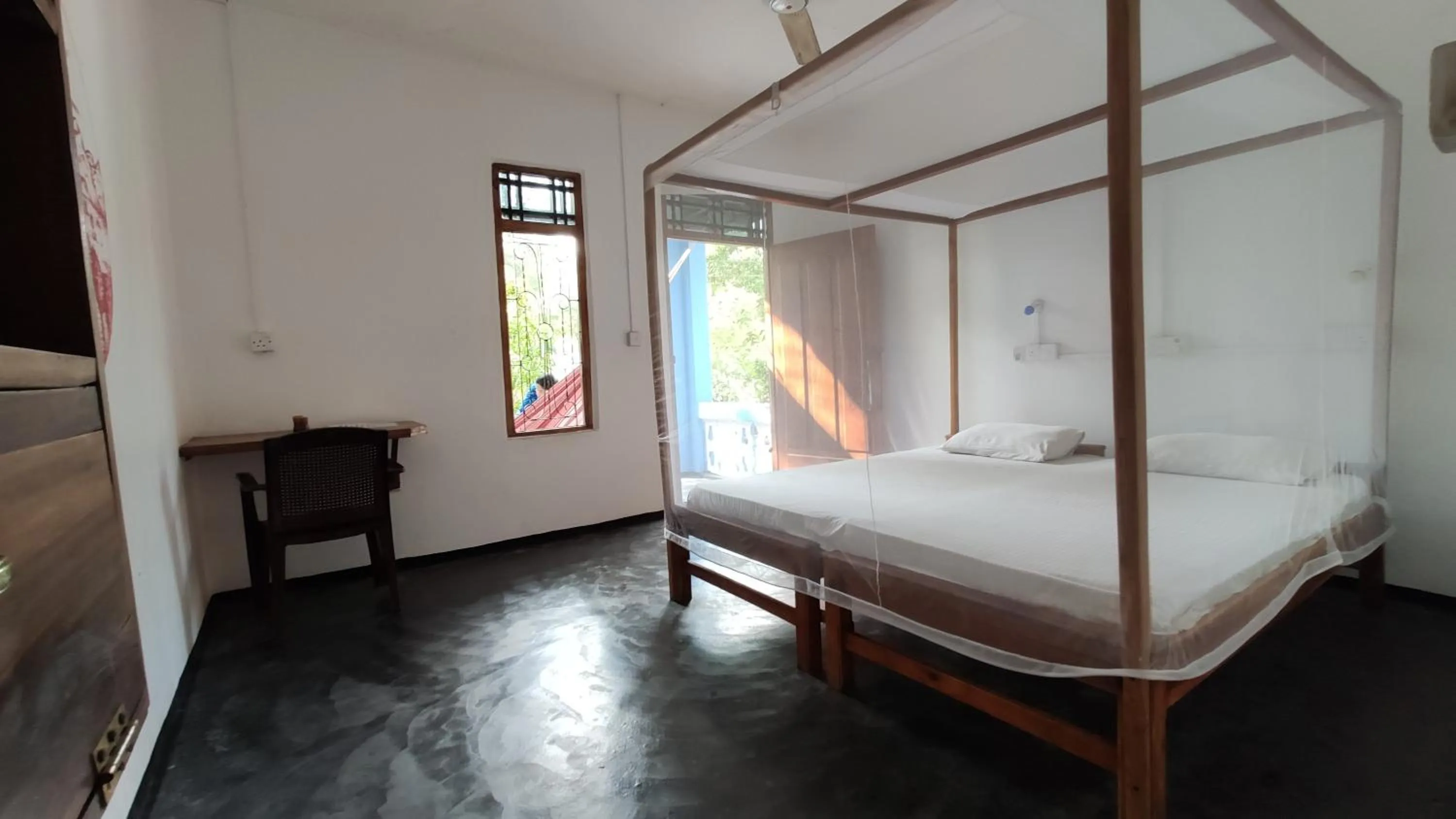 Bed in Surf Beach Hotel