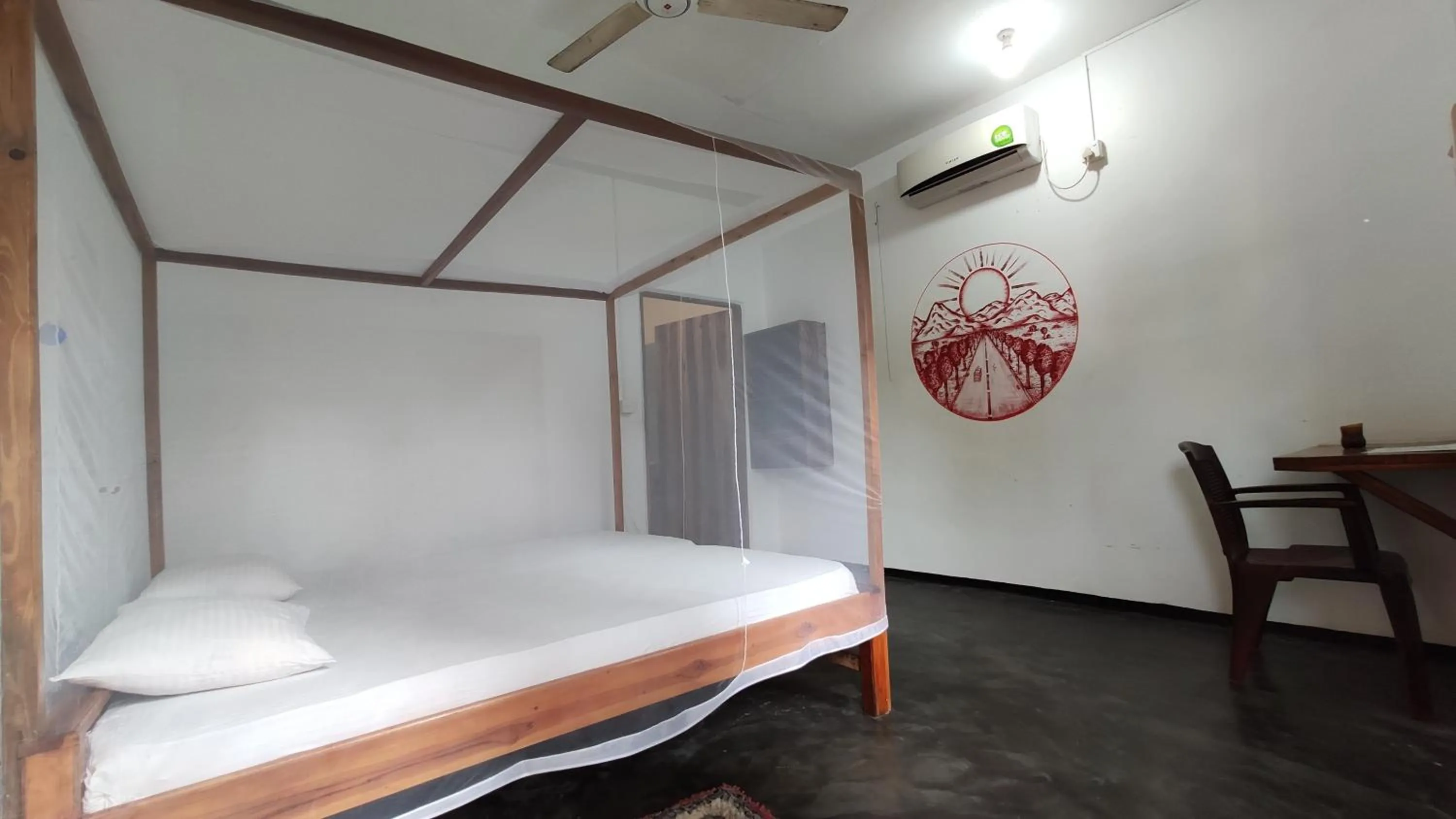 Bed in Surf Beach Hotel