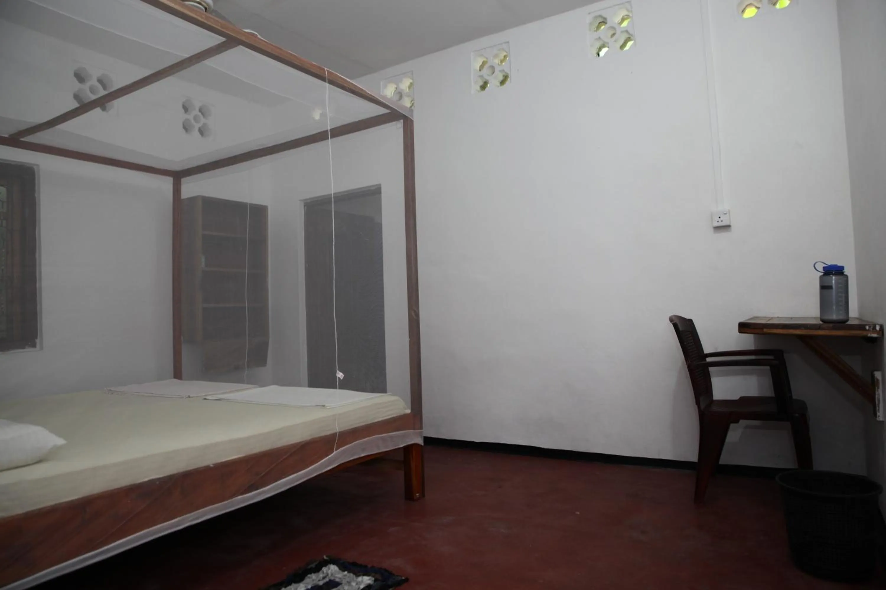 Bed in Surf Beach Hotel