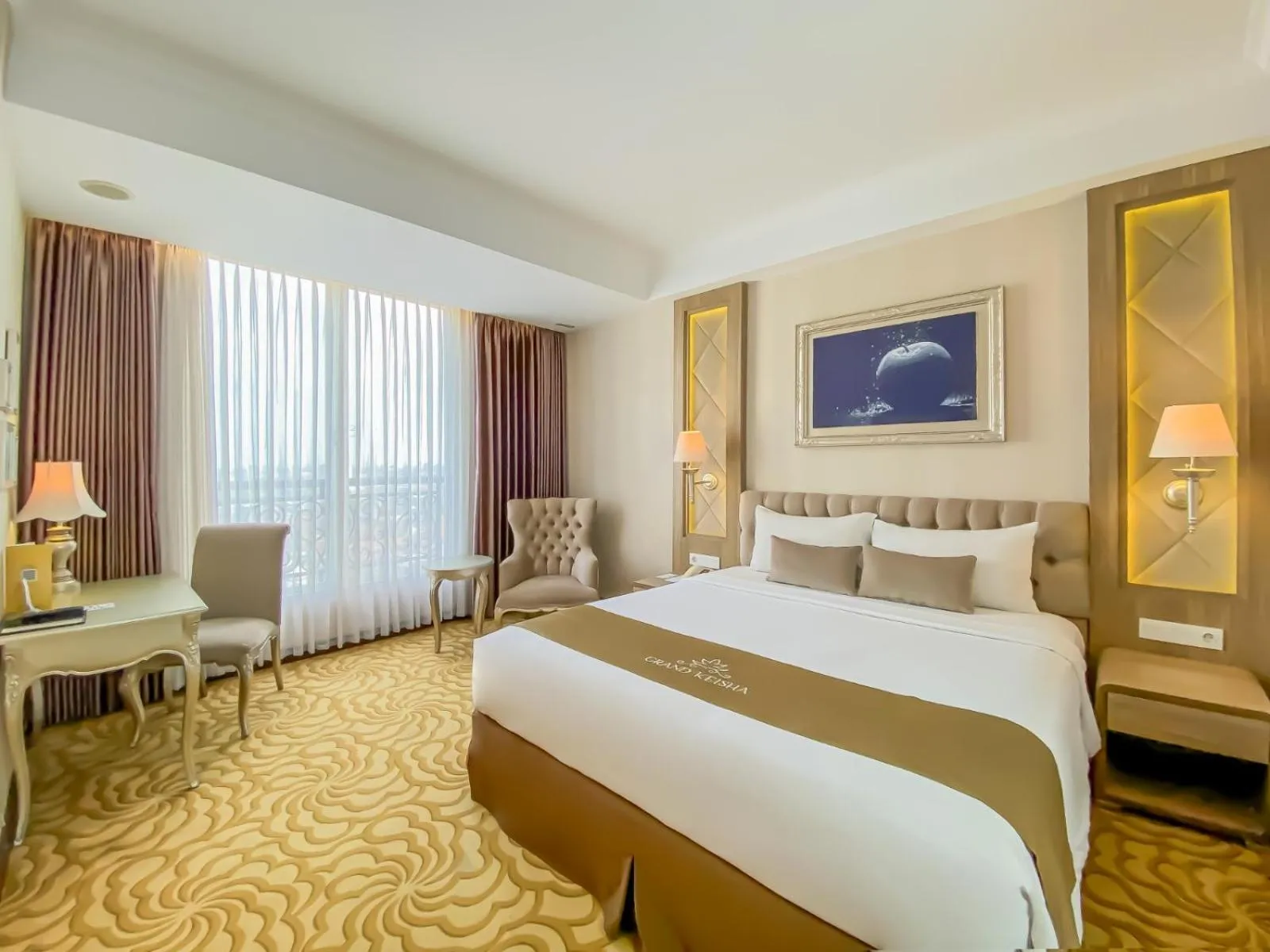 Bed in Grand Keisha Yogyakarta