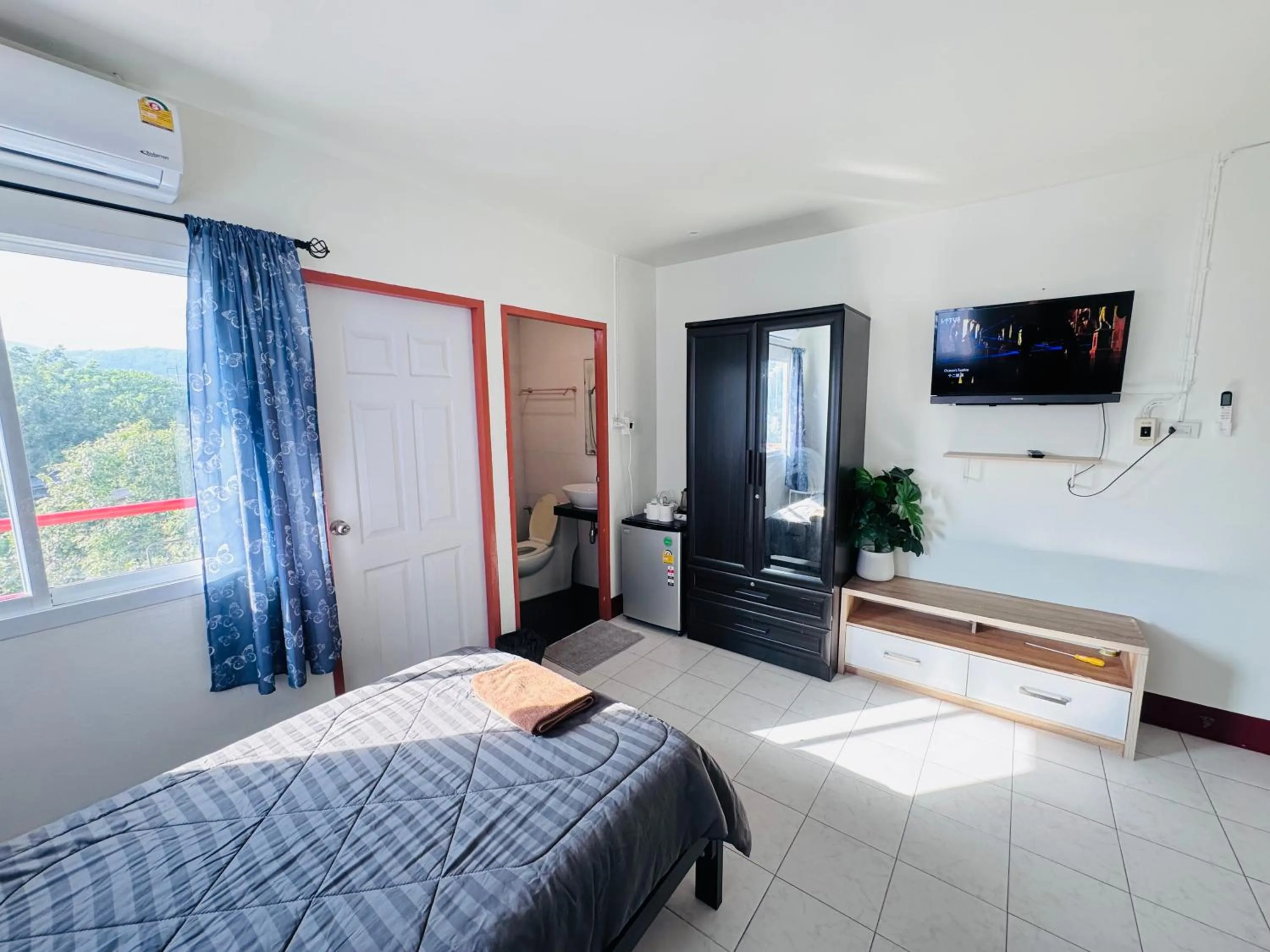 Bed in K.L.Apartment