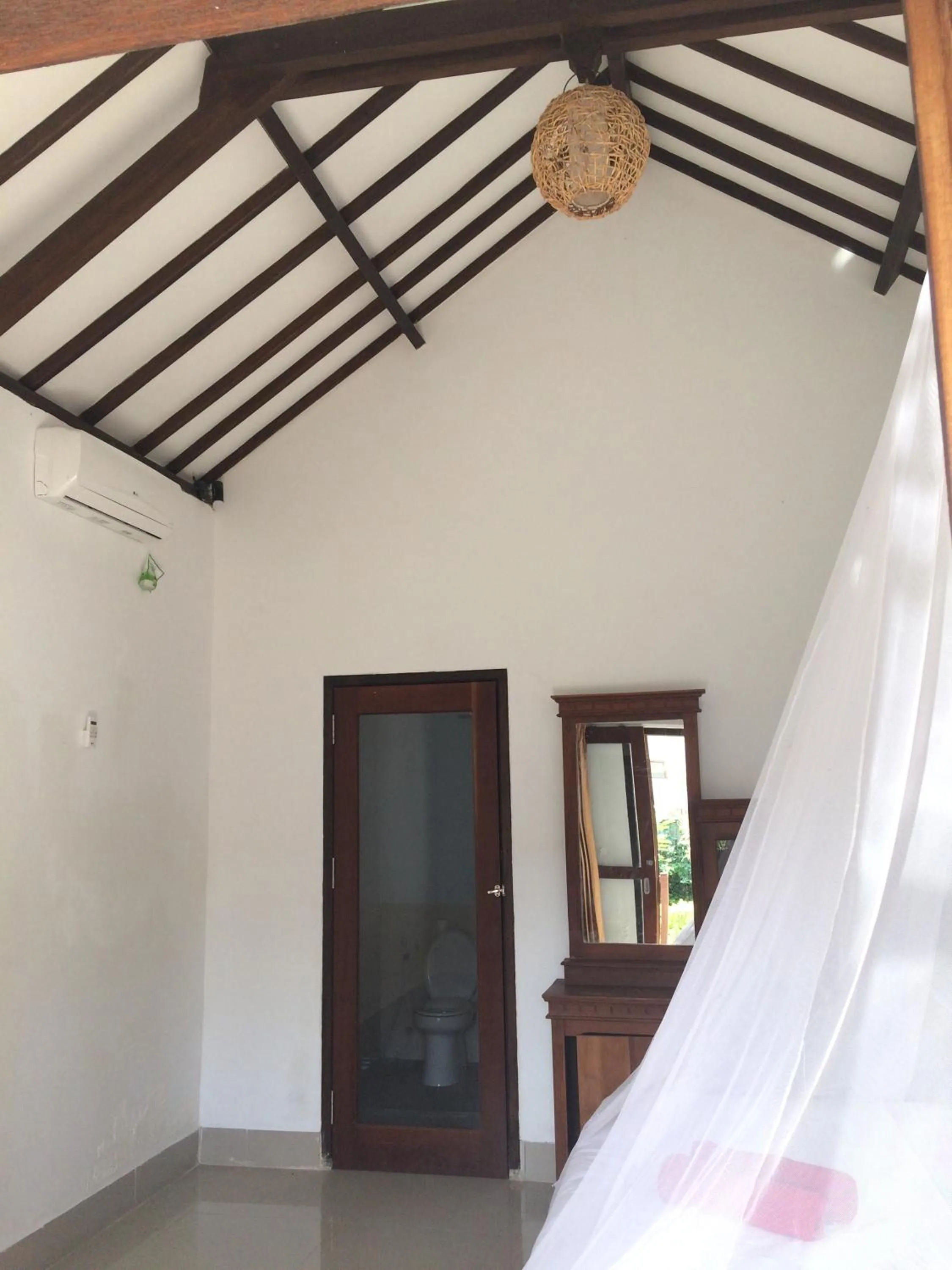 Photo of the whole room, Bed in Gili Beach