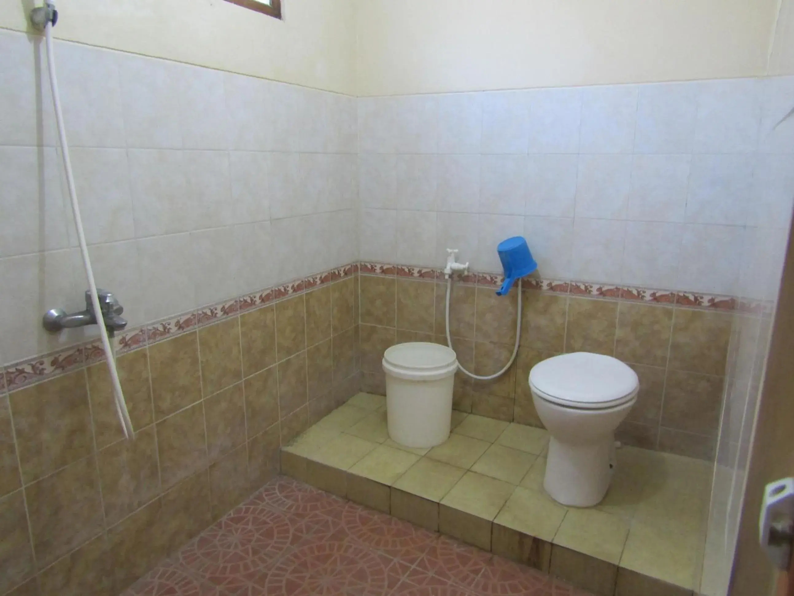 Bathroom in Hotel Family Syariah 1