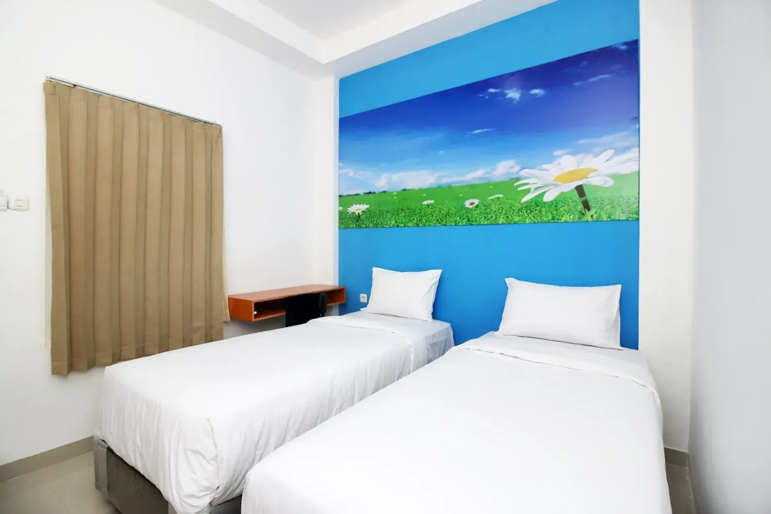 Standard Twin Room in RedDoorz Plus Syariah at Polamas Andalas Standard Twin Room in RedDoorz Plus Syariah at Polamas Andalas