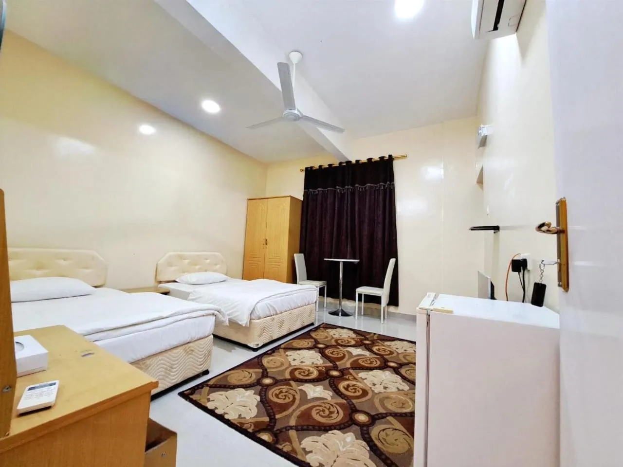 Bed in Luluat Al Afia Hotel Apartments