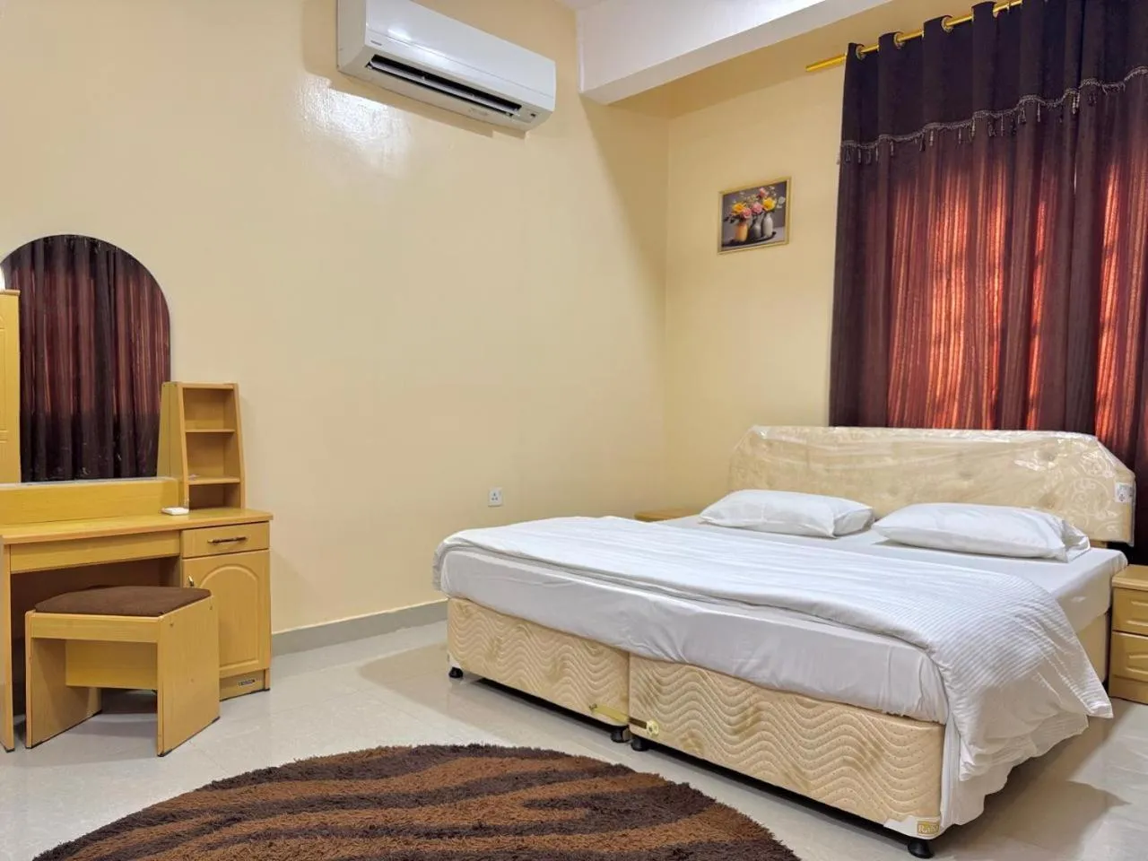 Bed in Luluat Al Afia Hotel Apartments