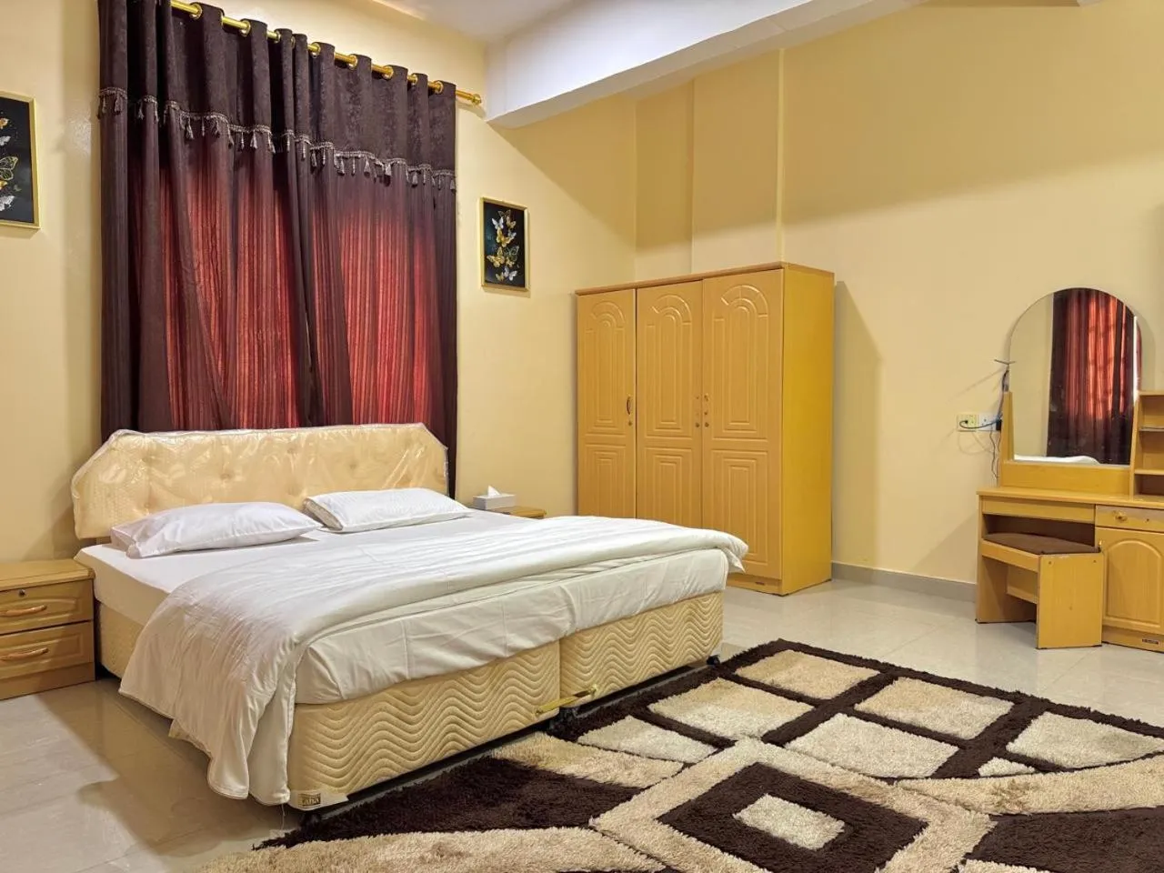 Bed in Luluat Al Afia Hotel Apartments