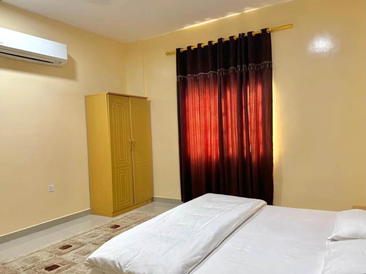Bed in Luluat Al Afia Hotel Apartments