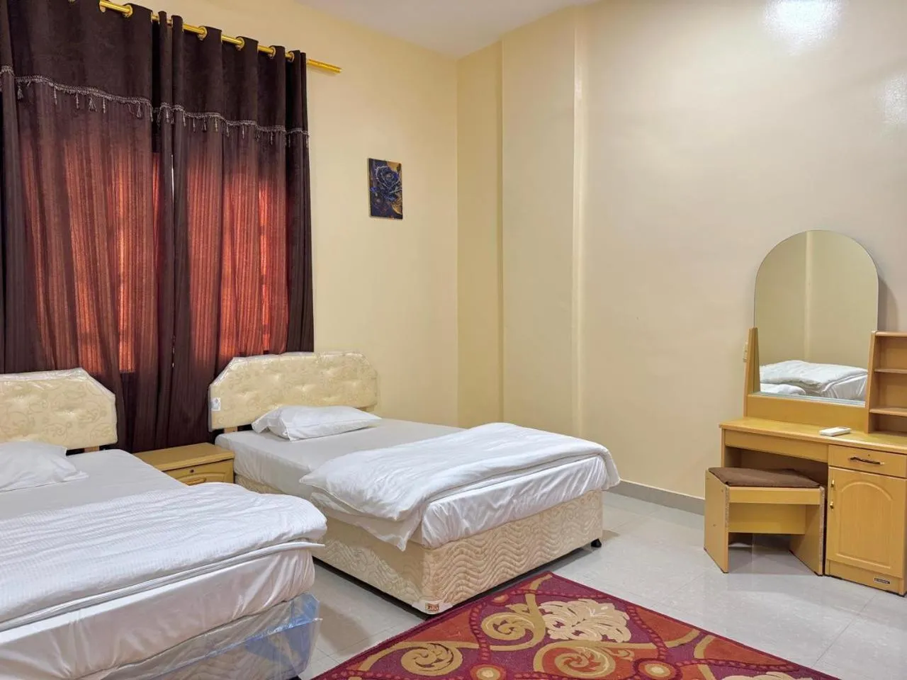 Bed in Luluat Al Afia Hotel Apartments