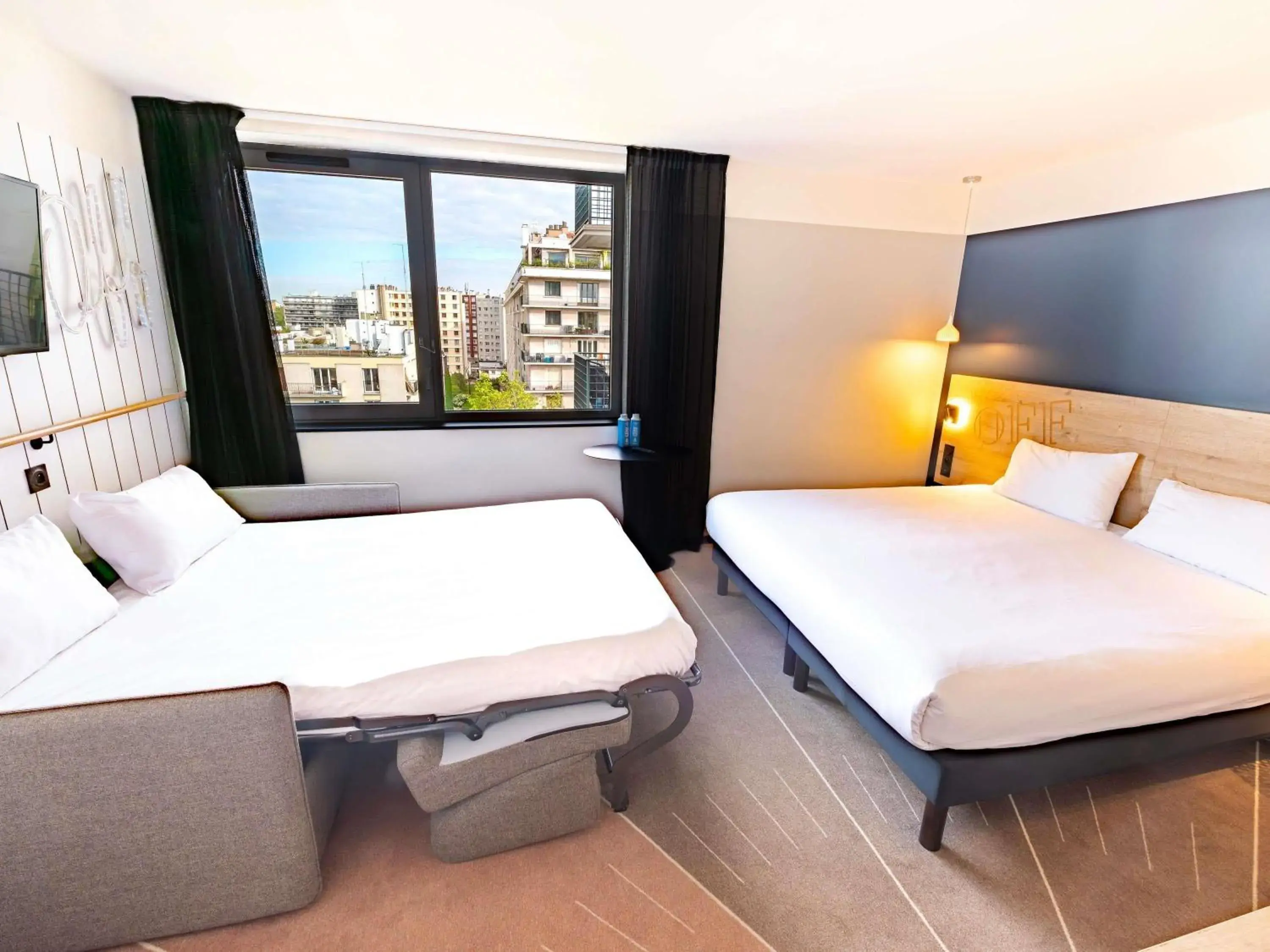Standard Family Suite with One Double Bed and Sofa in ibis Styles Paris 16 Boulogne Standard Family Suite with One Double Bed and Sofa in ibis Styles Paris 16 Boulogne