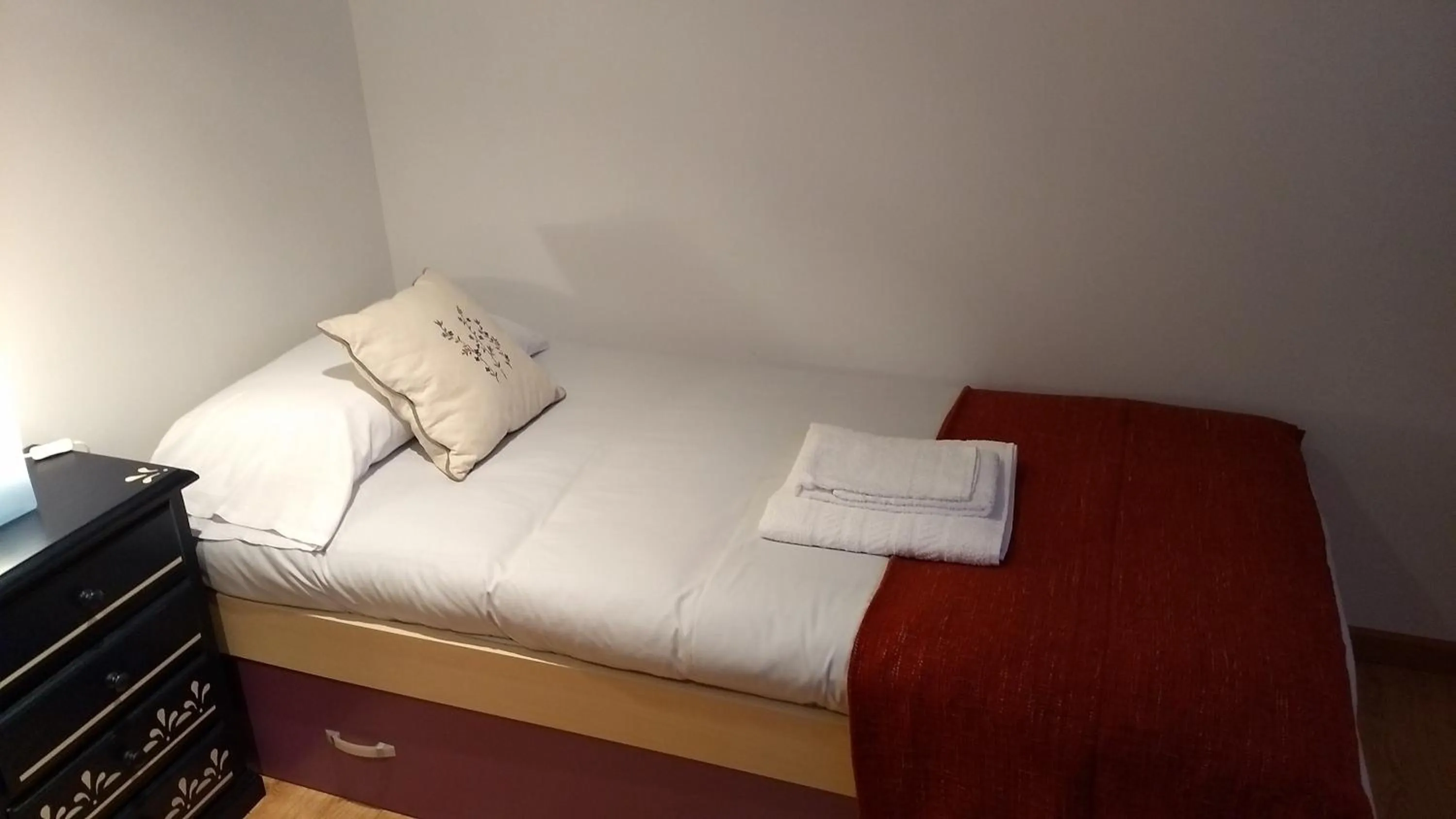 Bed in Apartamentos O Almacen