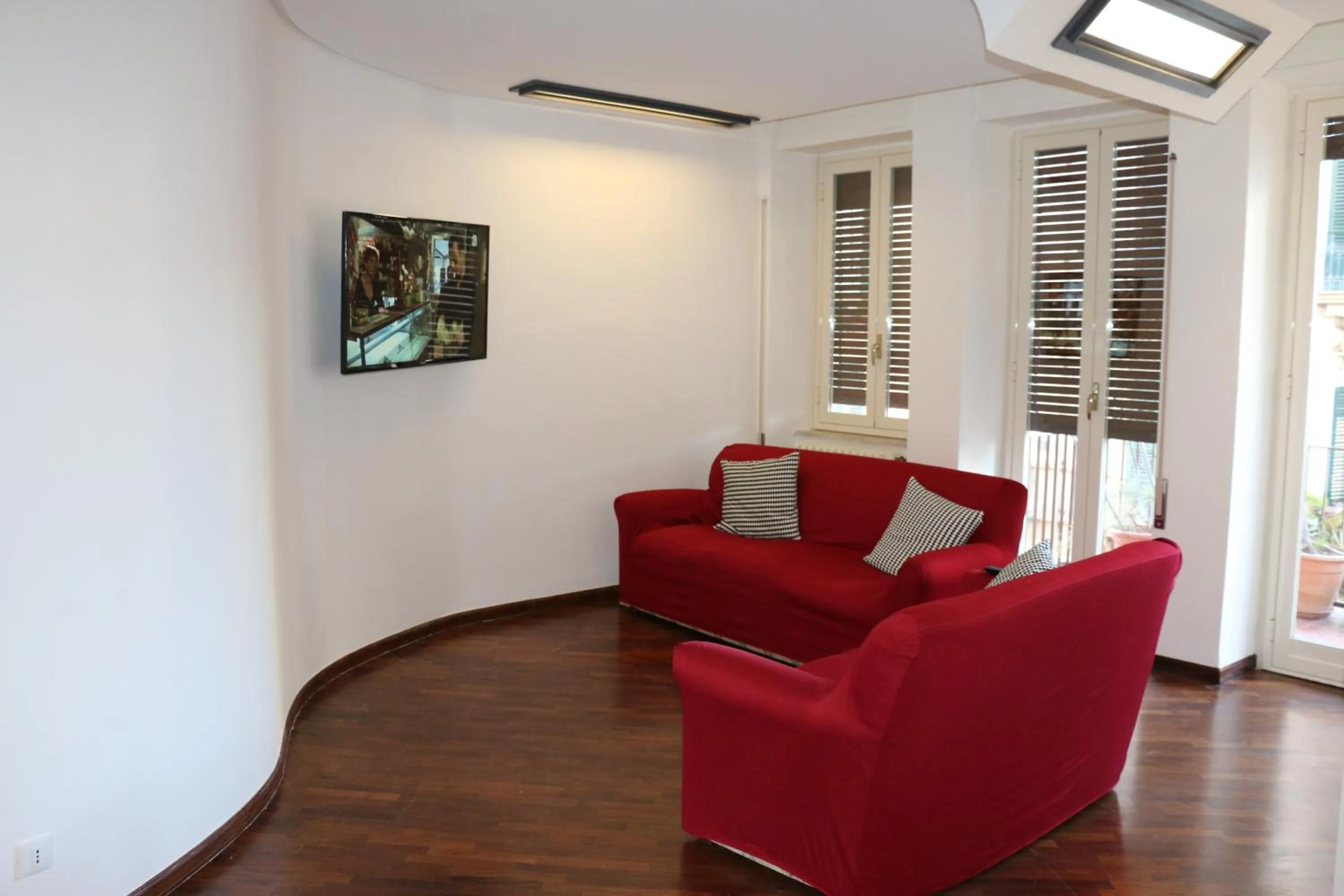 Communal lounge/ TV room in Zammù