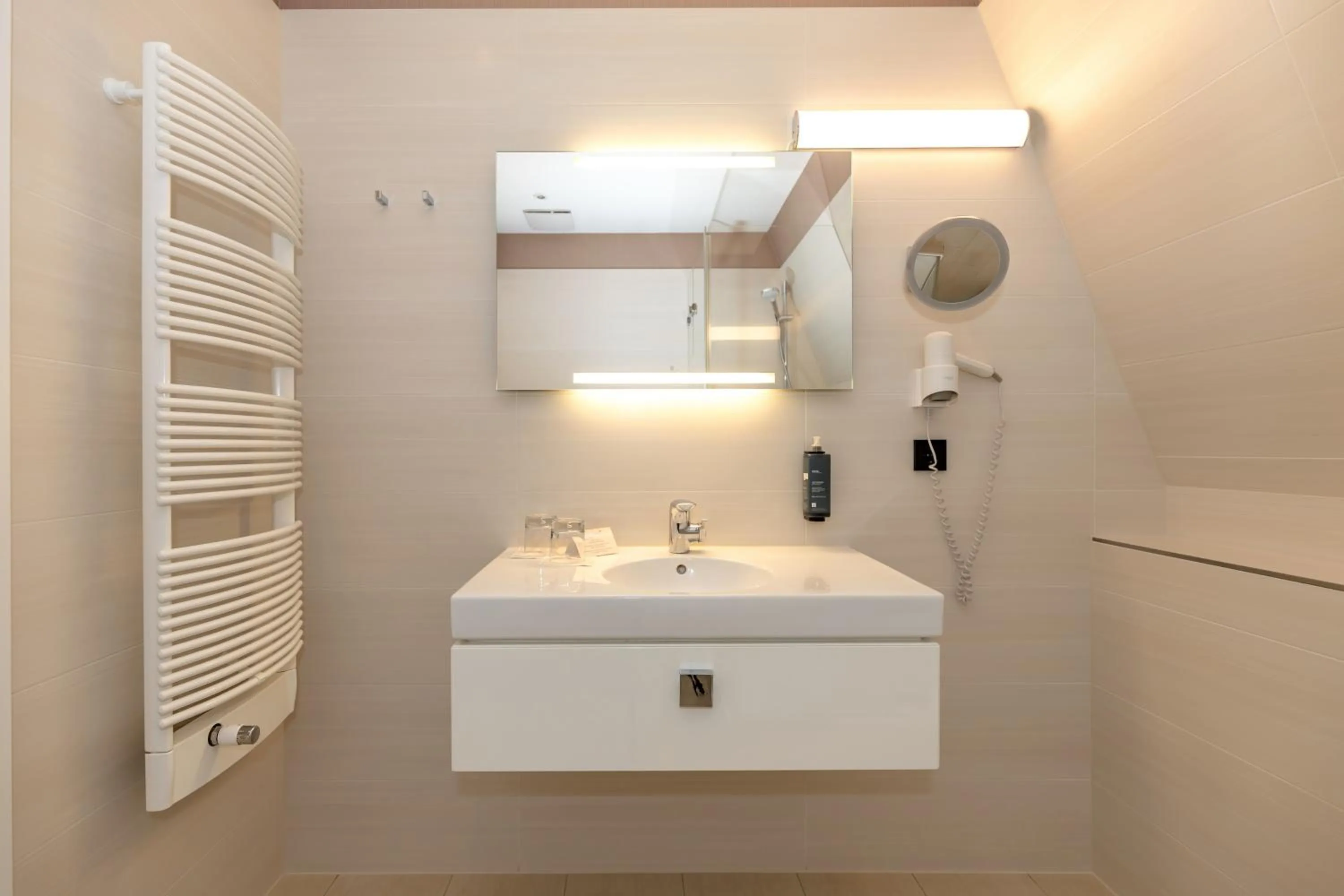 Bathroom in HOTEL am STRAND