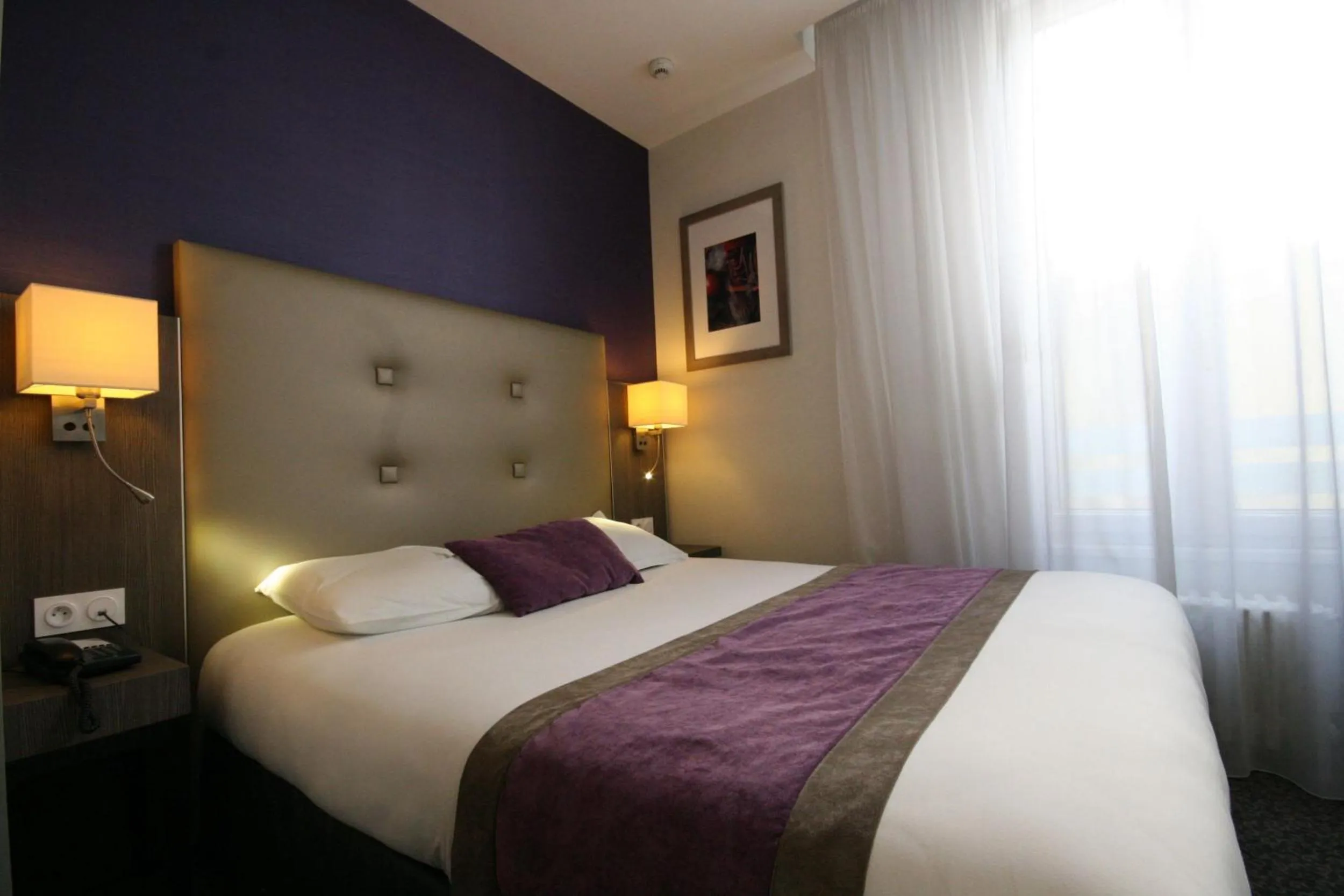 Bed in Hotel de la Gare Troyes Centre