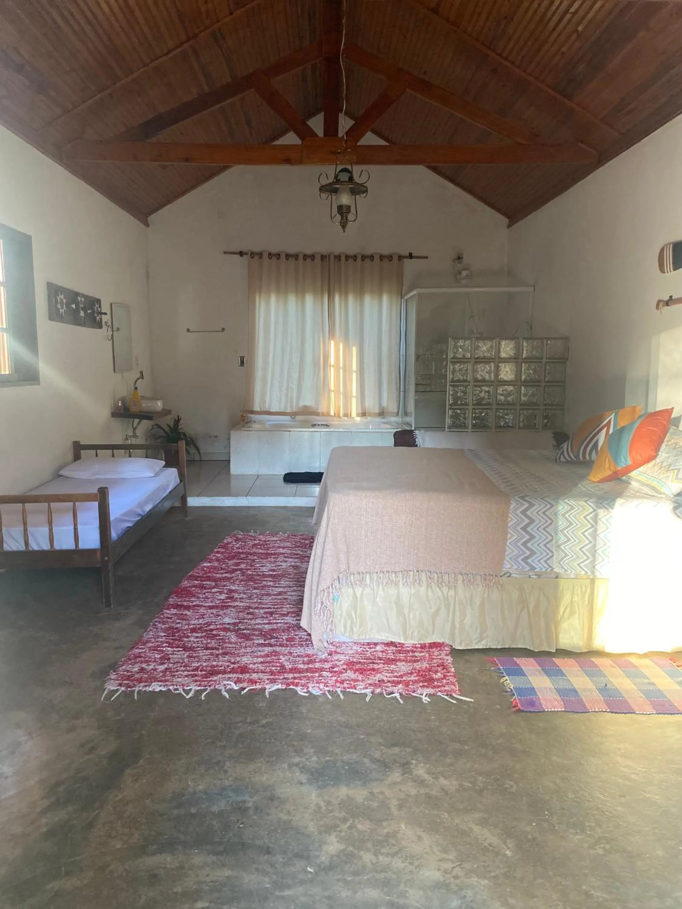 Photo of the whole room, Bed in Pousada Chalés da Lua