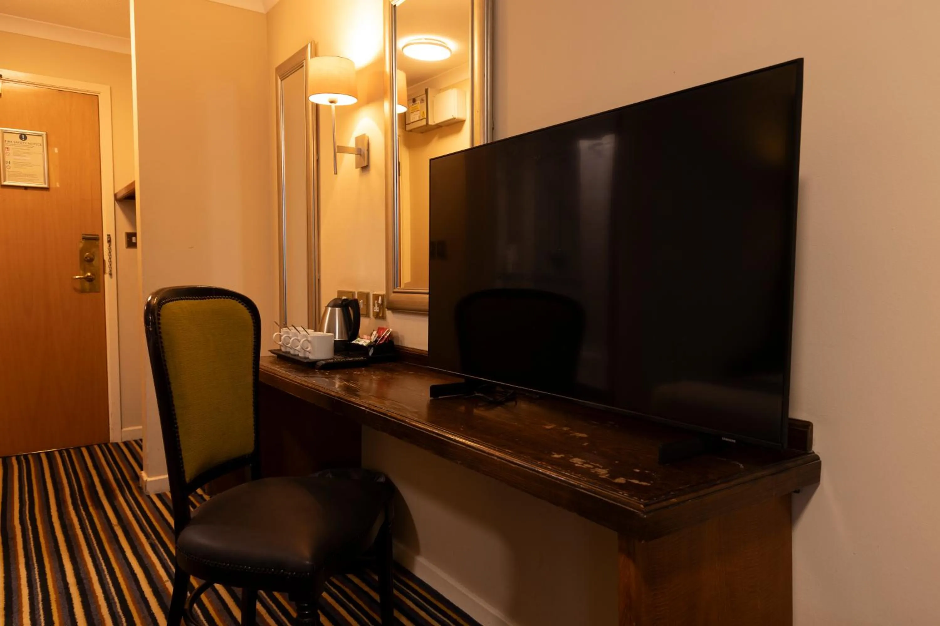 TV and multimedia in Weathervane Hotel by Greene King Inns