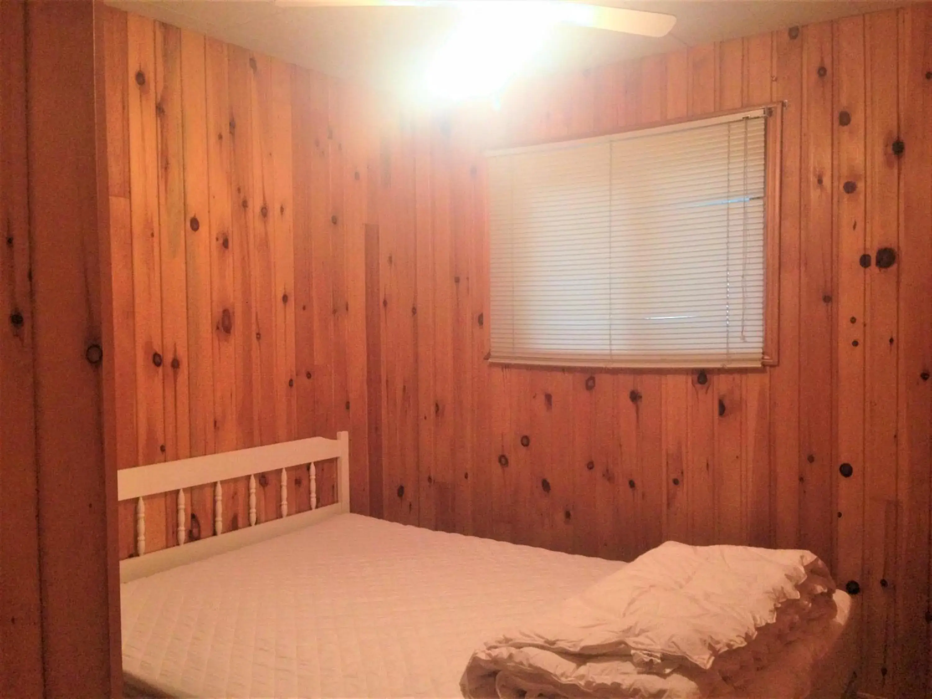 Photo of the whole room, Bed in High Falls Bay Cottages, Camping & Waterpark