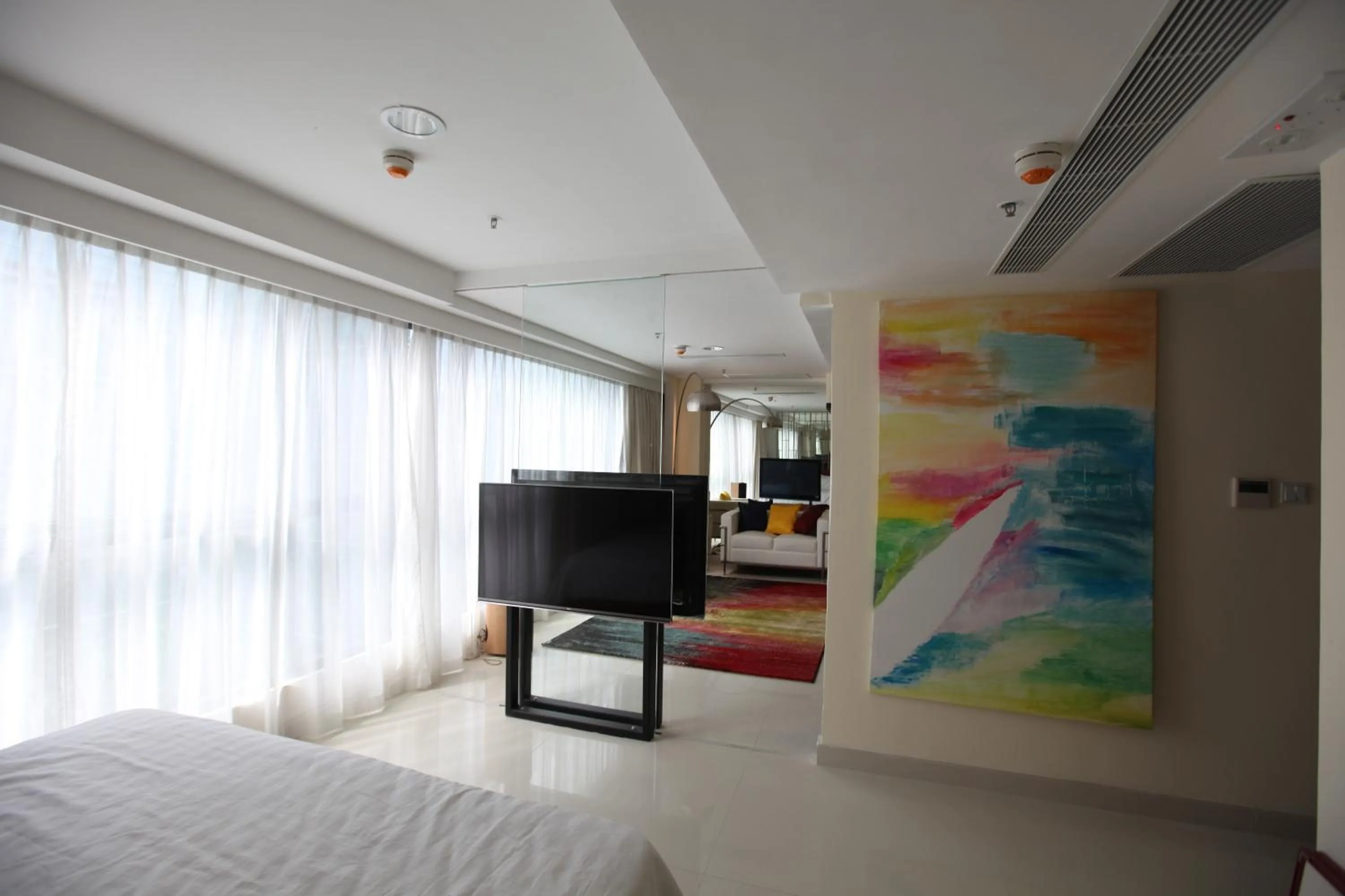 Living room, Bed in IW Hotel