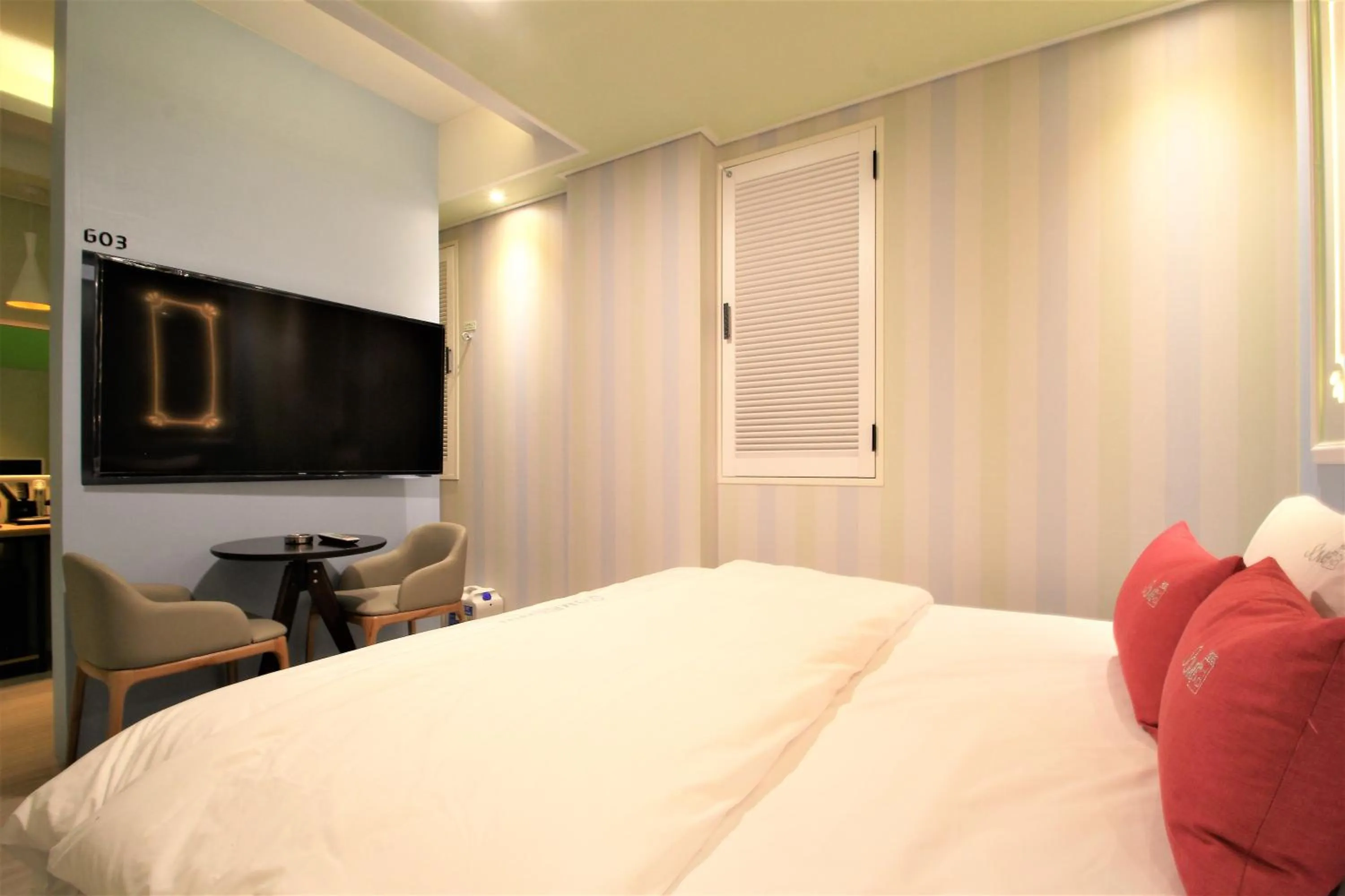 Bedroom, TV/Entertainment Center in Some Hotel