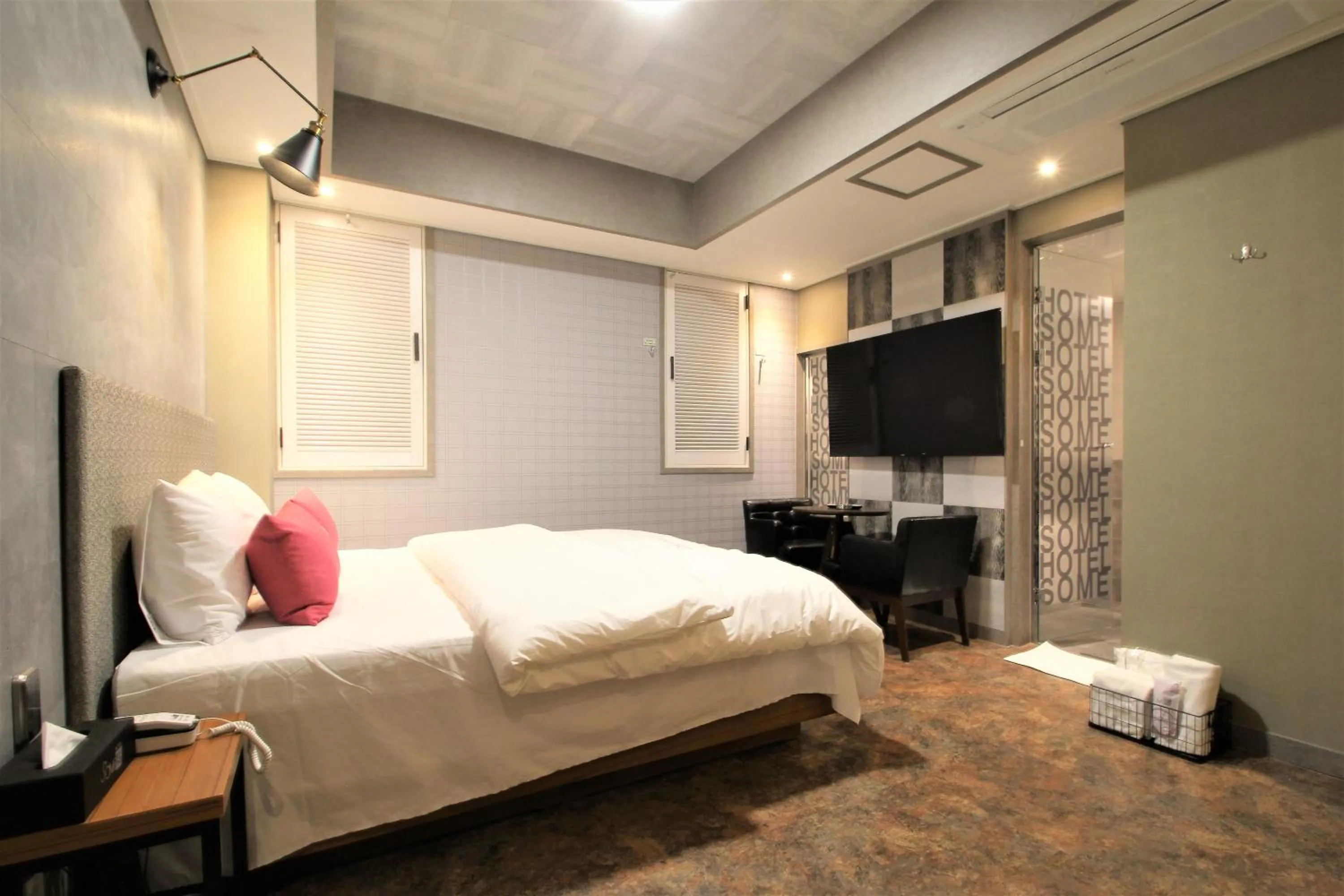 Bedroom, TV/Entertainment Center in Some Hotel