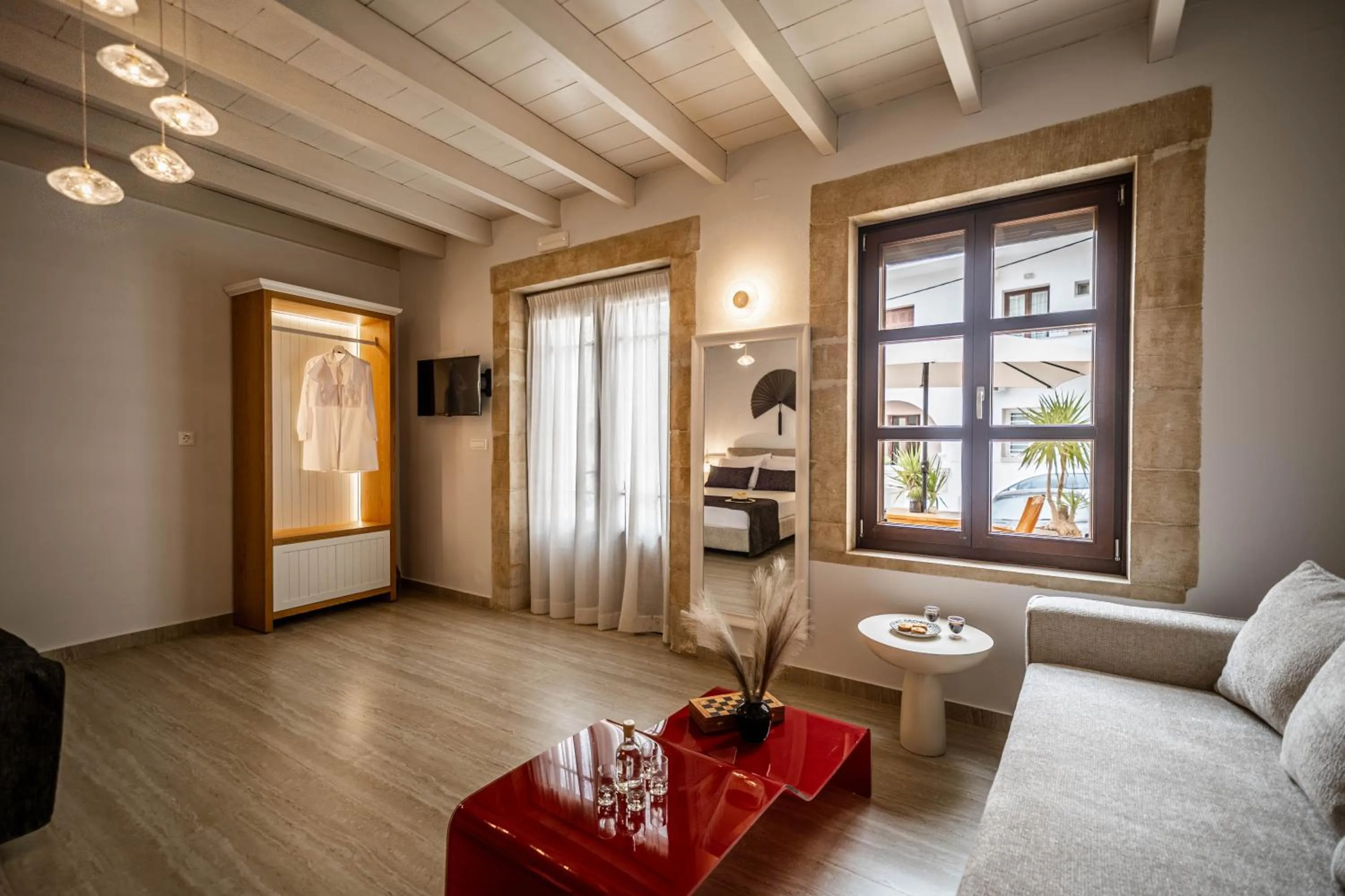 TV and multimedia in Lithinon Luxury Suites with Free Parking