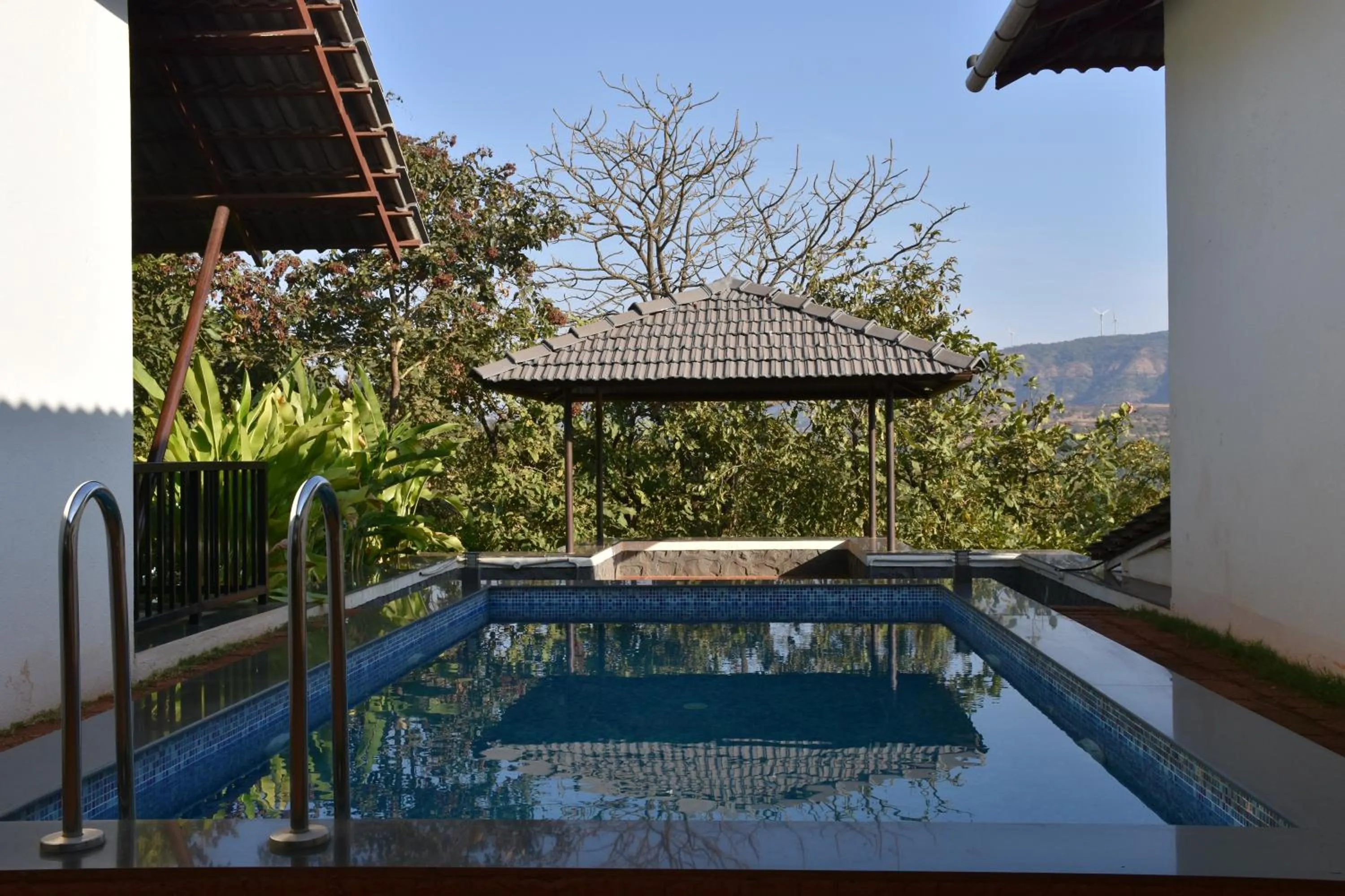 Swimming pool in Forest Escapes Koyna