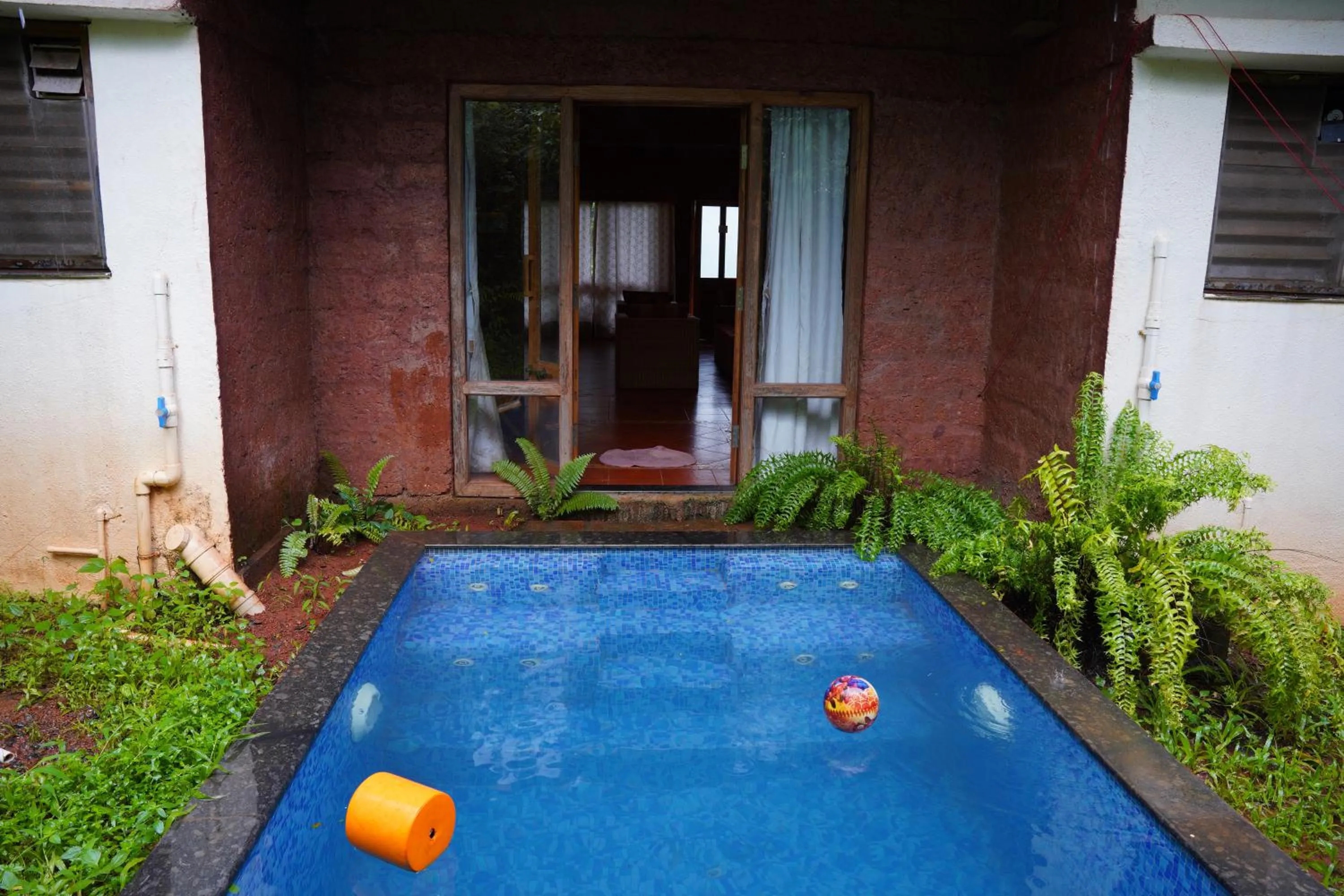 Swimming pool in Forest Escapes Koyna