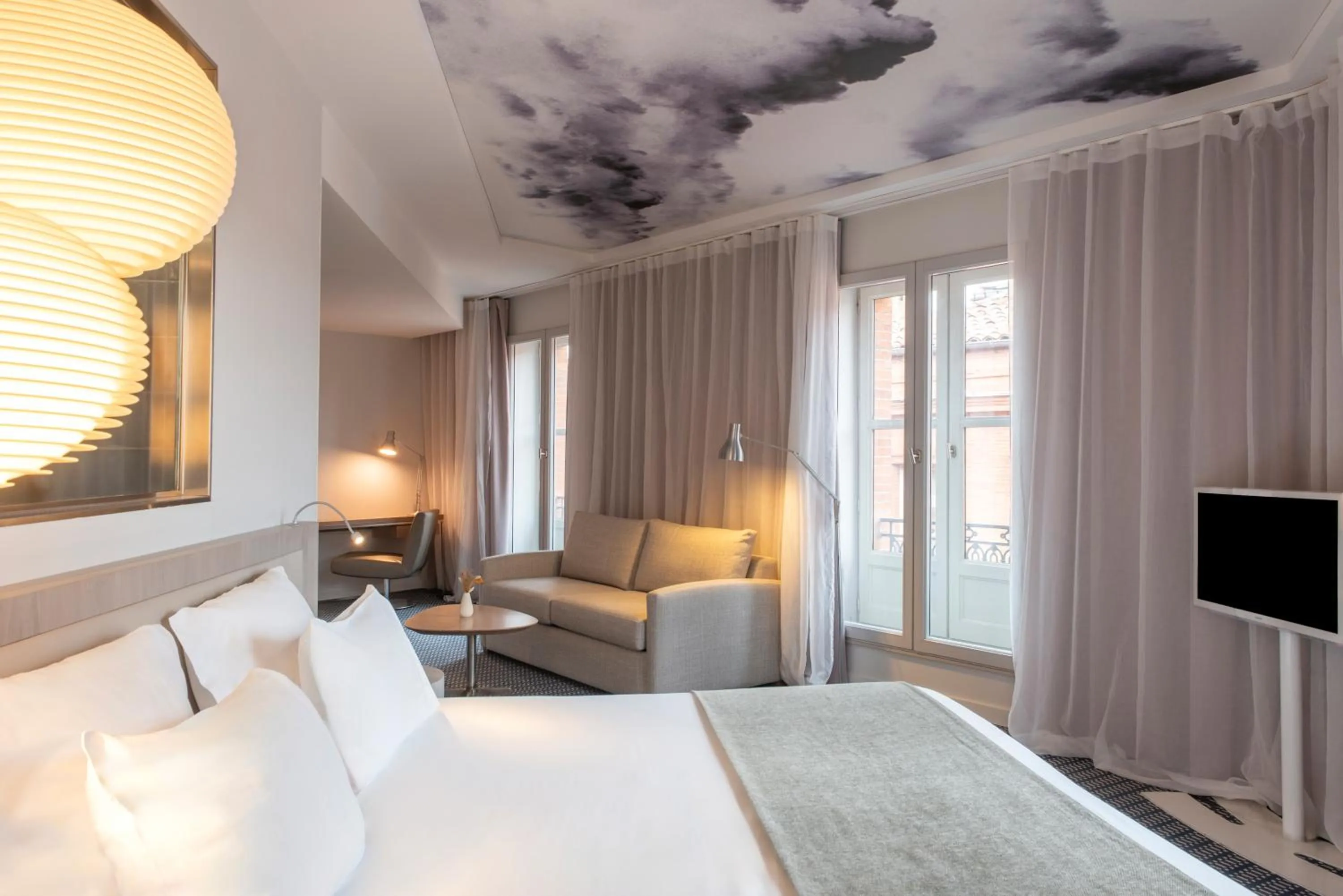 Bedroom, Bed in Le Grand Balcon Hotel