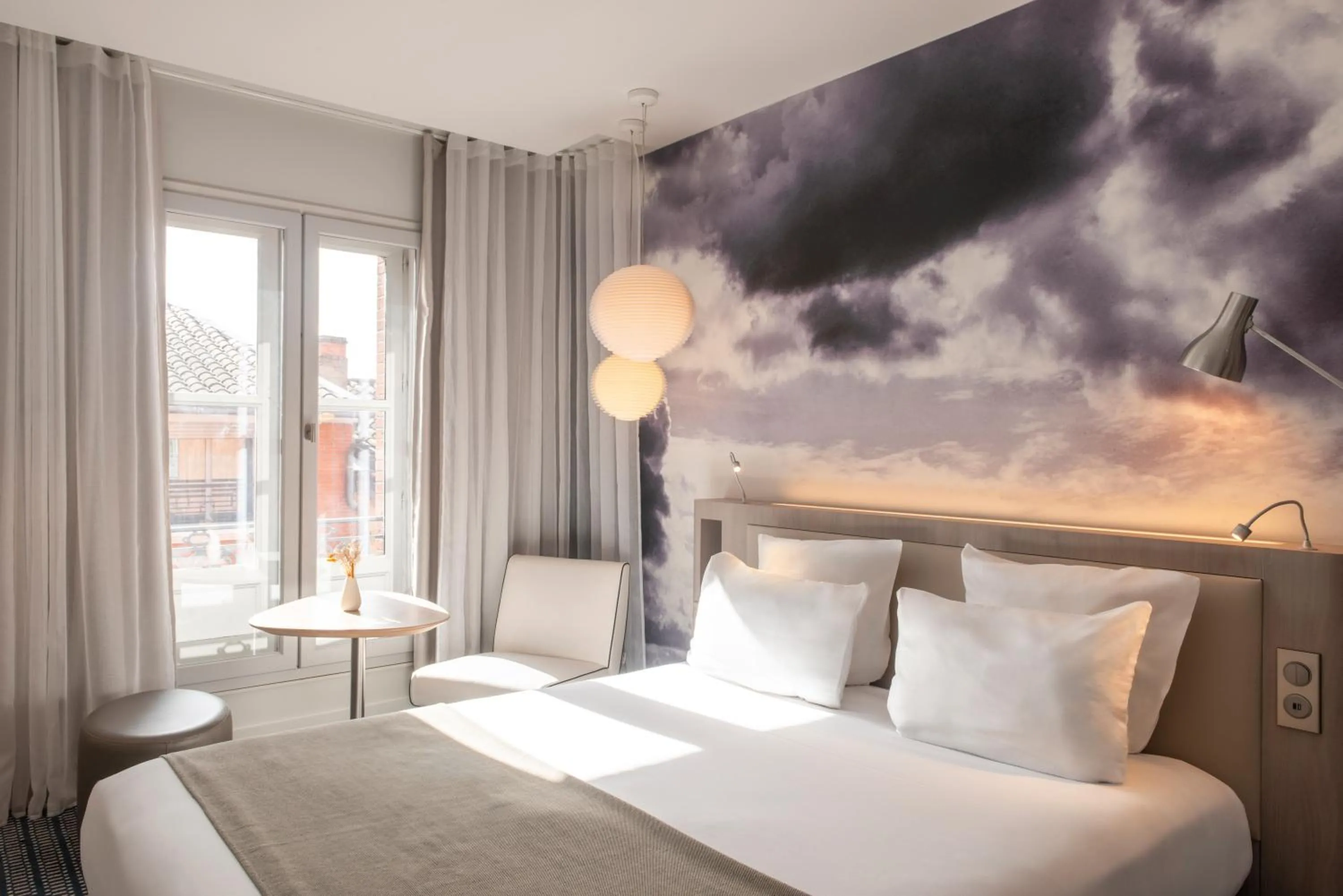 Bedroom, Bed in Le Grand Balcon Hotel