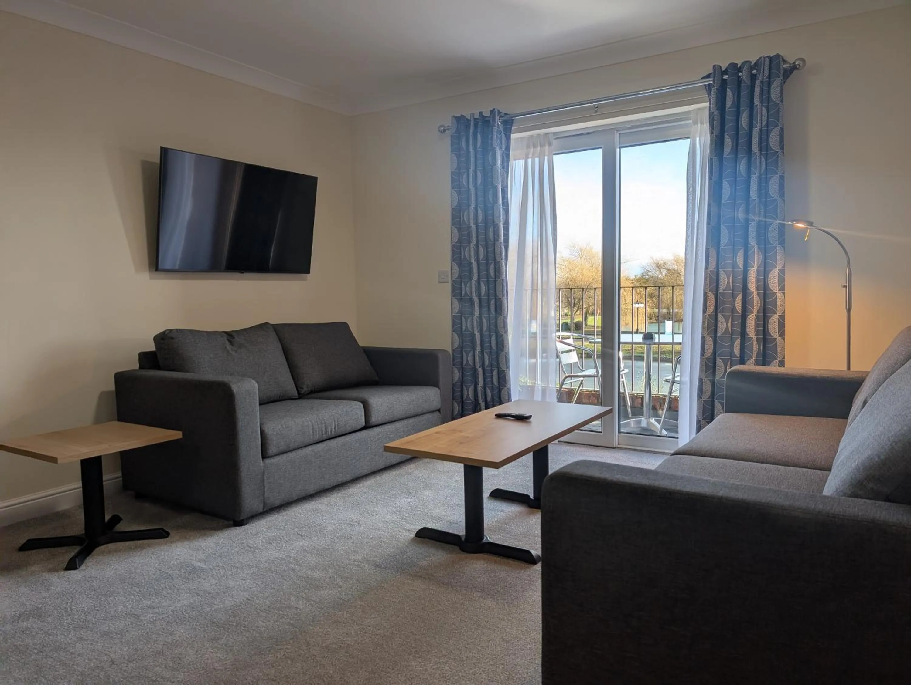 Communal lounge/ TV room in Southview Park Hotel