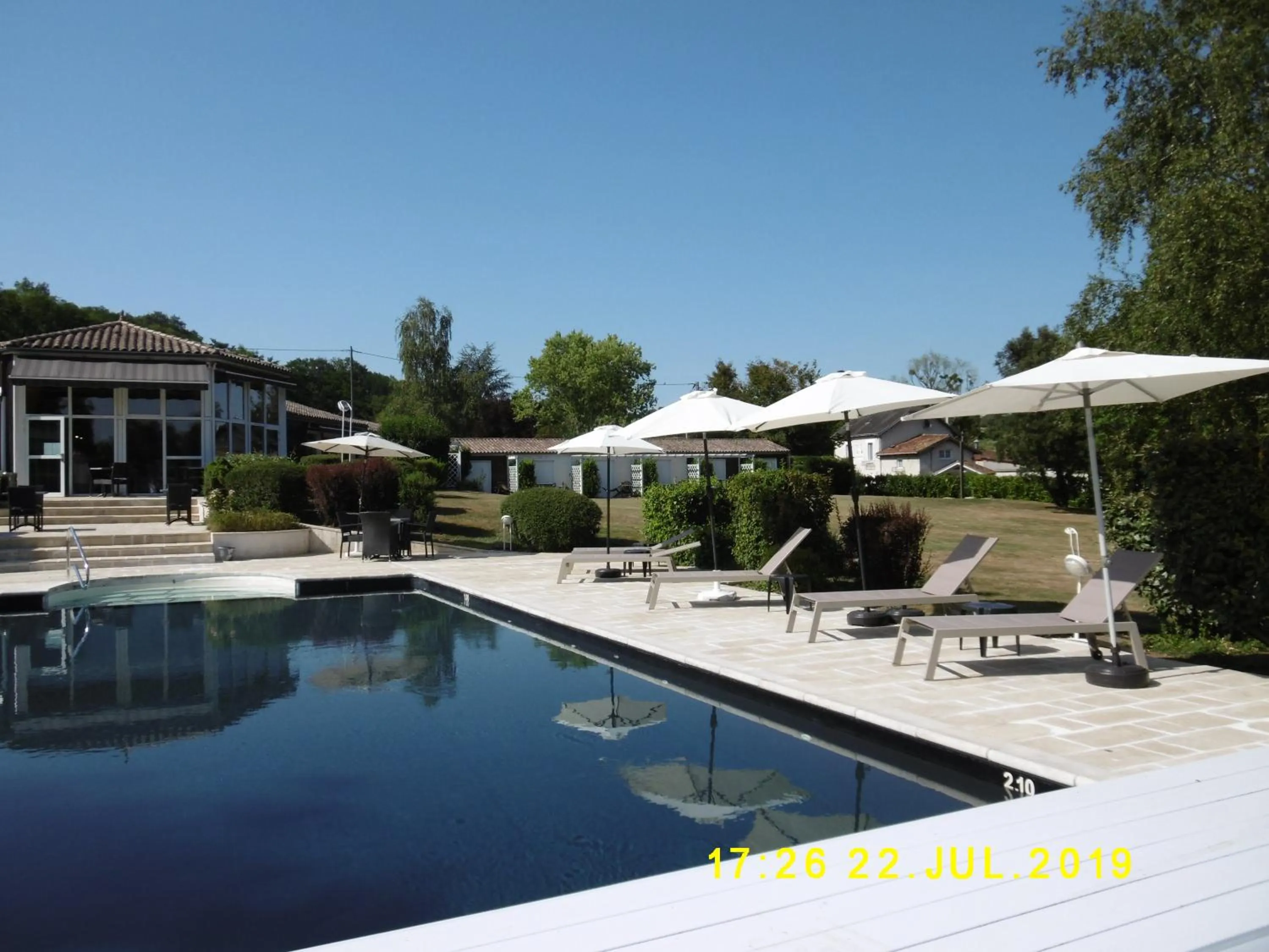 Patio in Logis Hôtel Val de Vienne