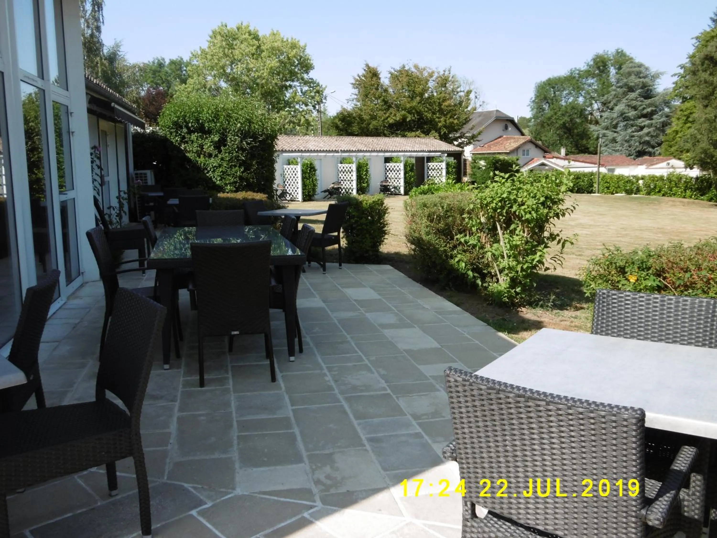 Patio in Logis Hôtel Val de Vienne