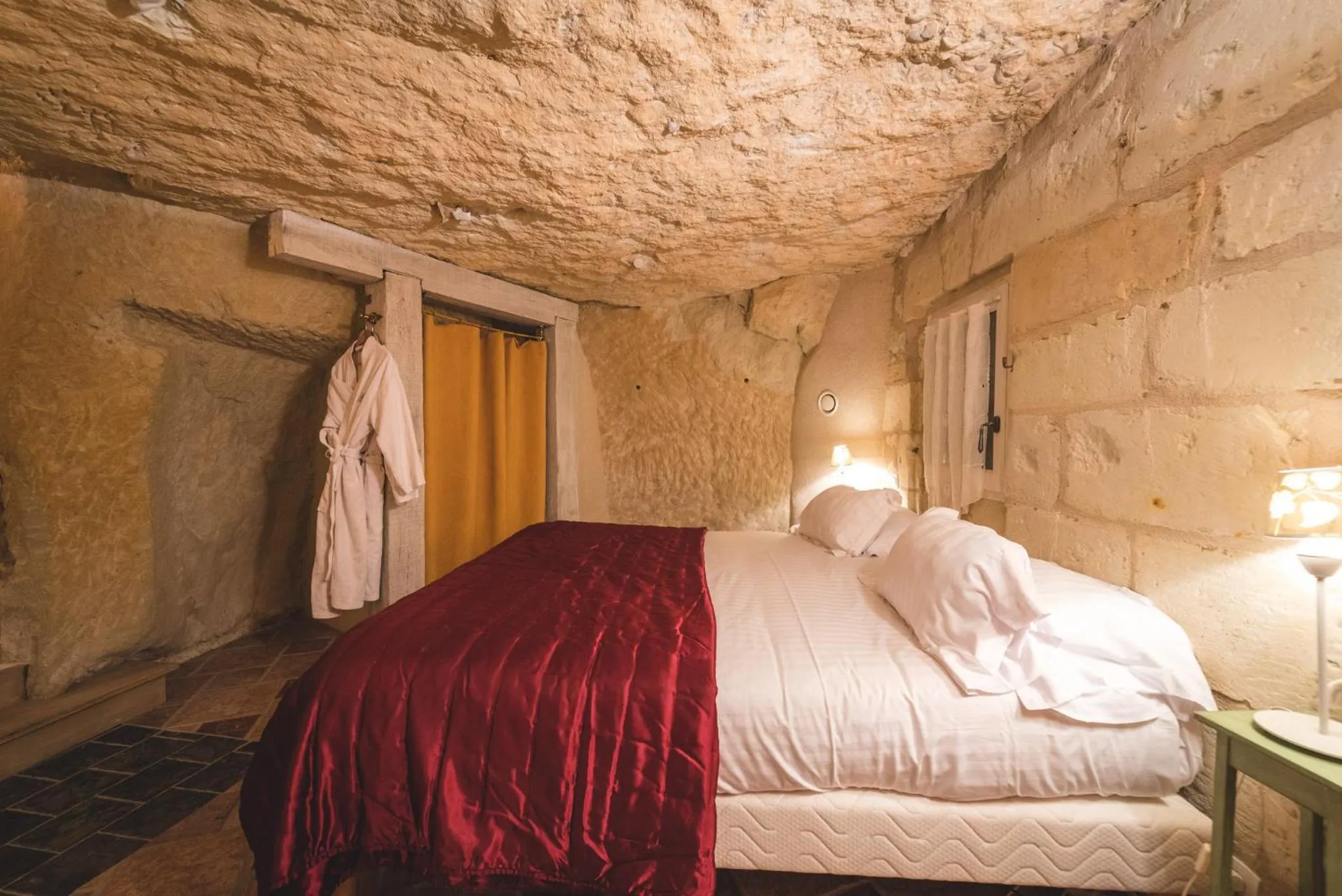 Bed in Logis Demeure de la Vignole