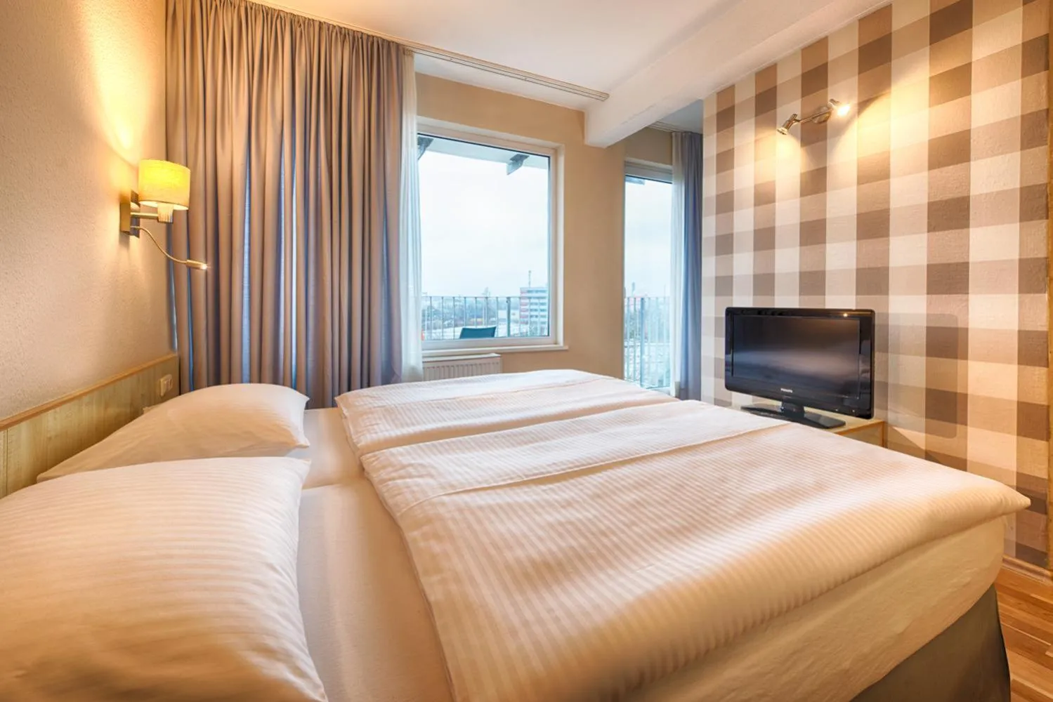 TV and multimedia, Bed in enjoy hotel Berlin City Messe