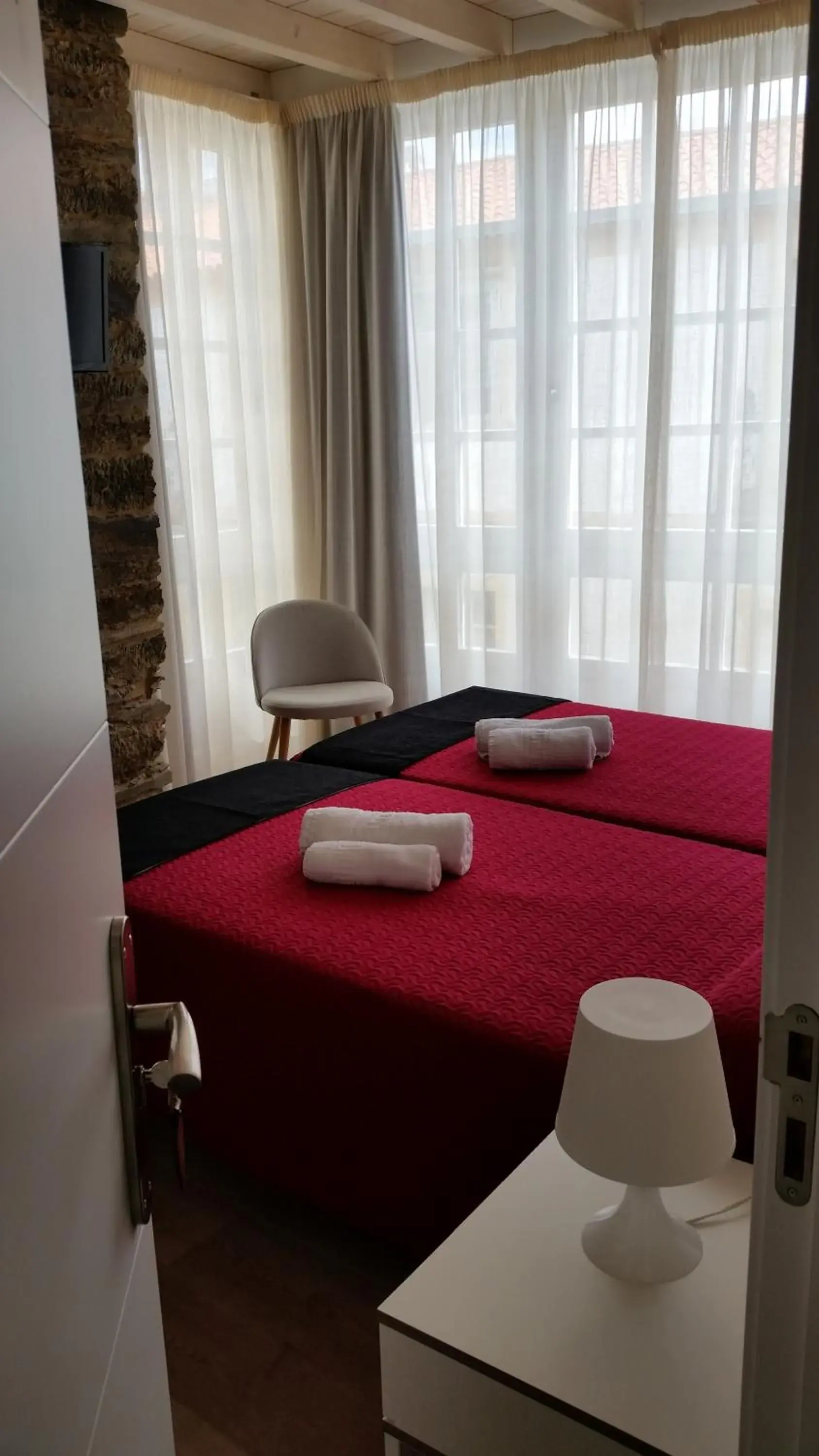 Bed in Pensión Domus Gallery Bed in Pensión Domus Gallery