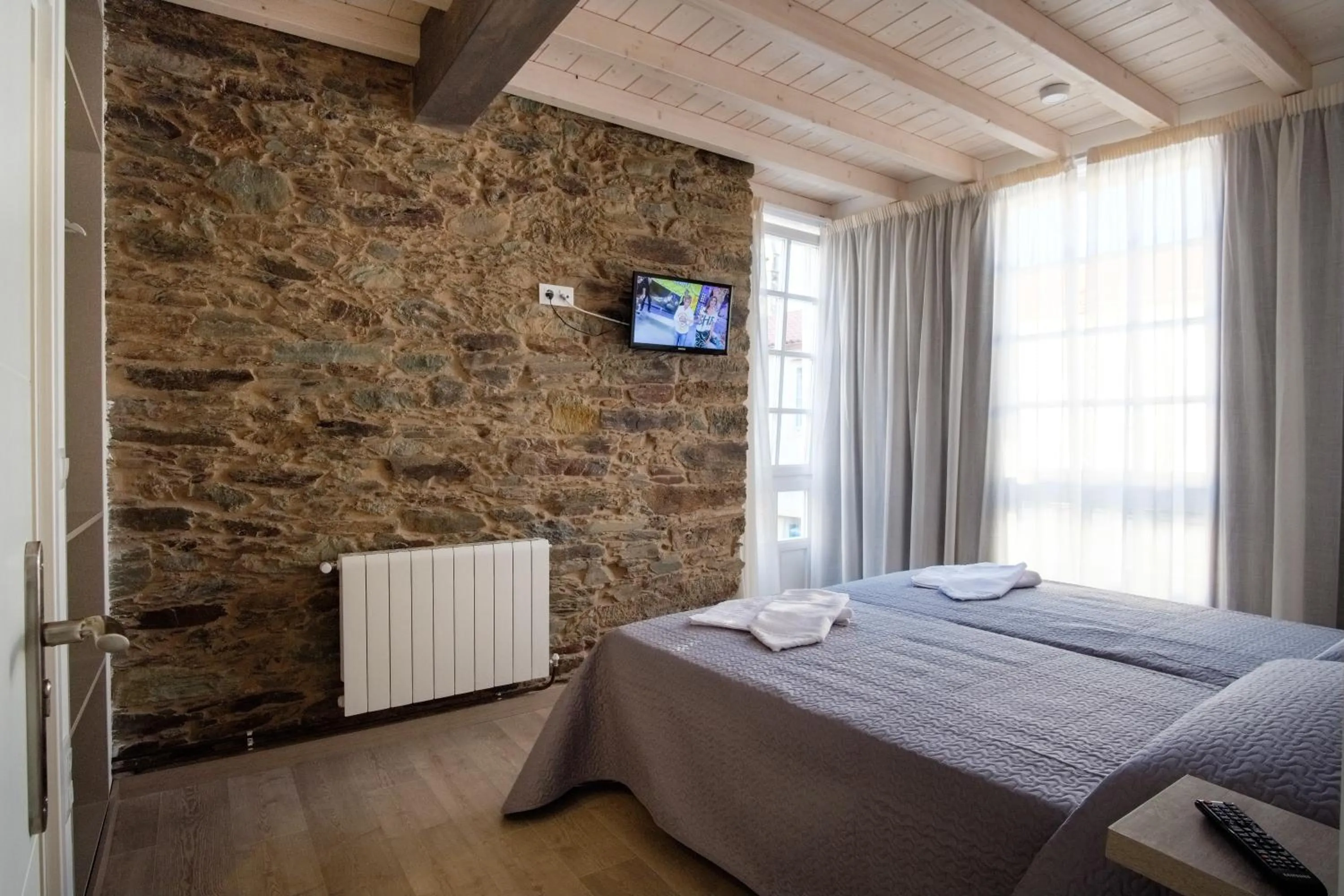 Staff, Bed in Pensión Domus Gallery